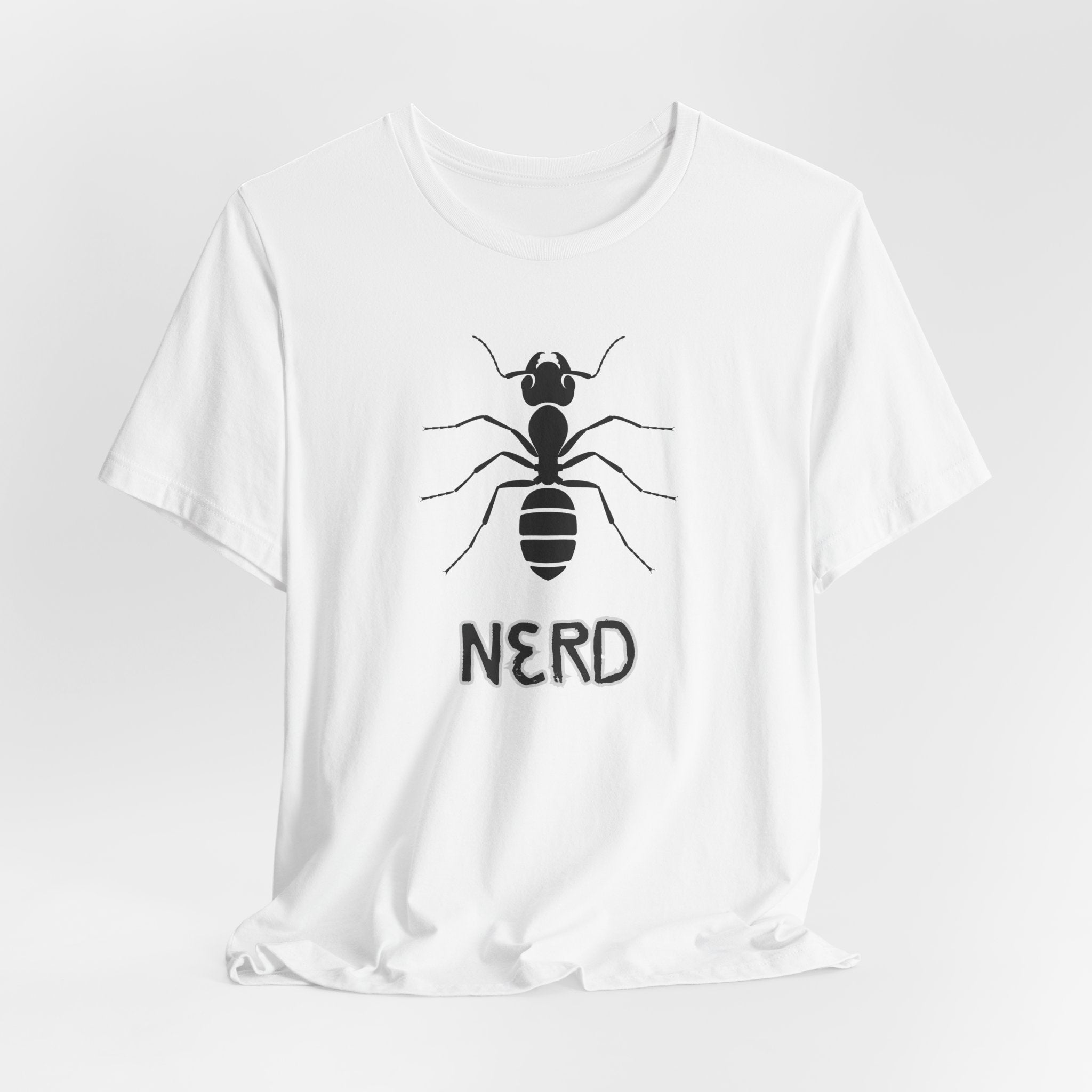 White t-shirt with an ant design and text nerd on a light gray background