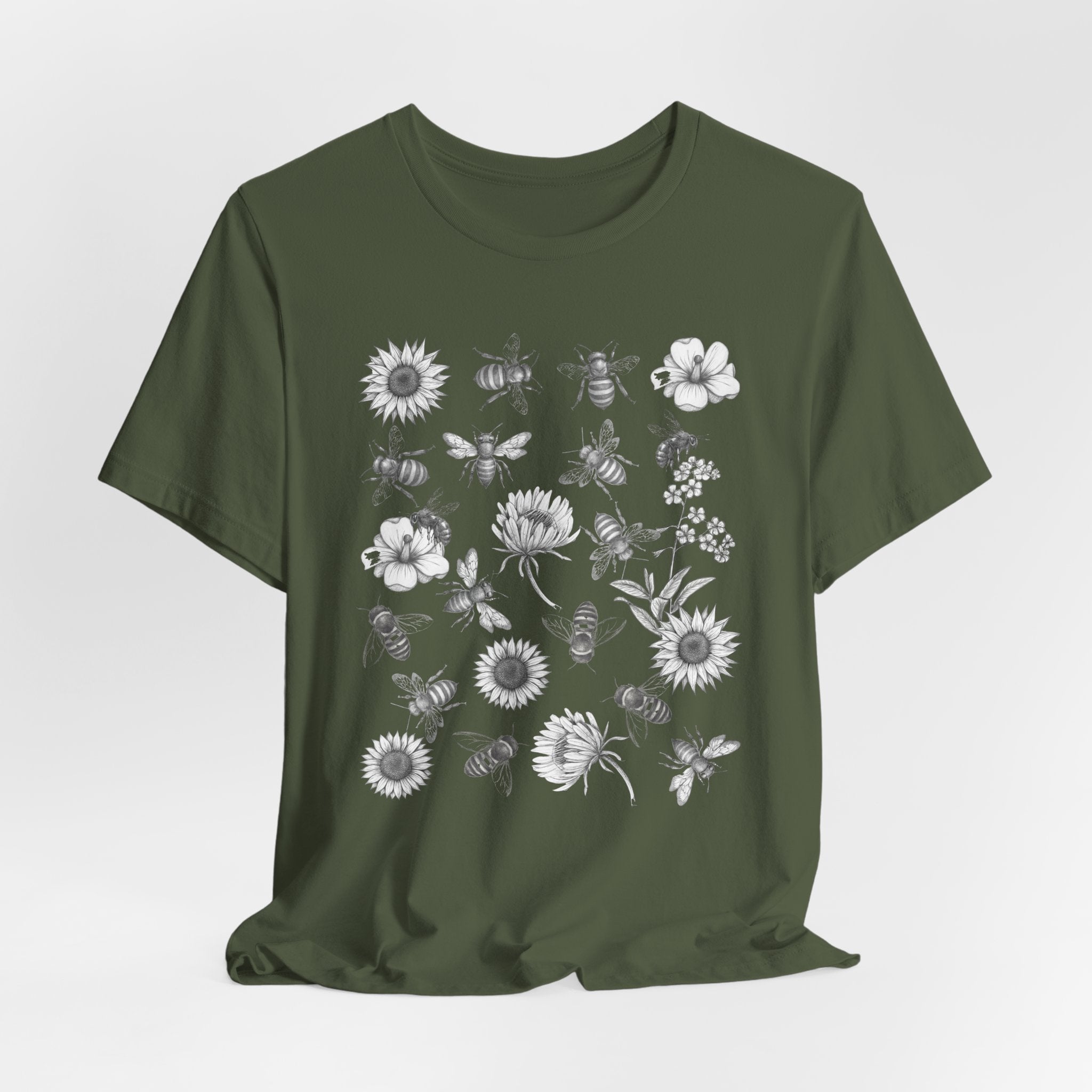 Green t-shirt with white graphic design on a light gray background