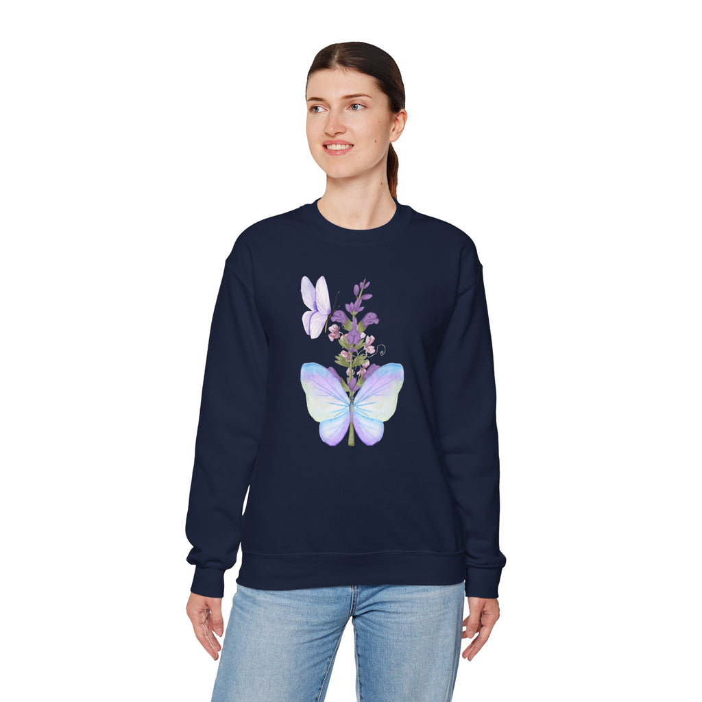 Person wearing a navy sweatshirt with a butterfly design on a white background