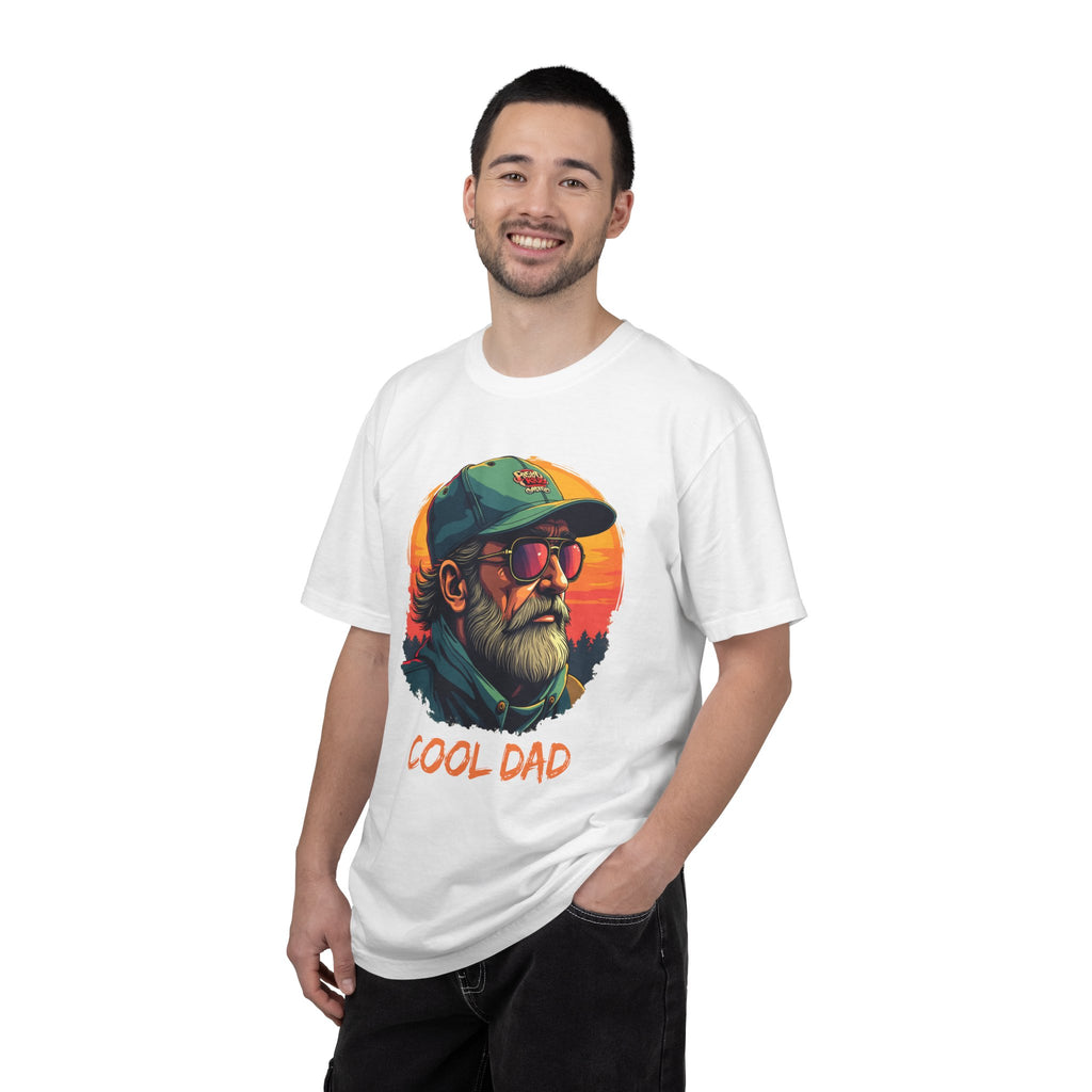 Man wearing a t-shirt with 'Cool Dad' graphic design featuring a man with sunglasses and a cap on a white background