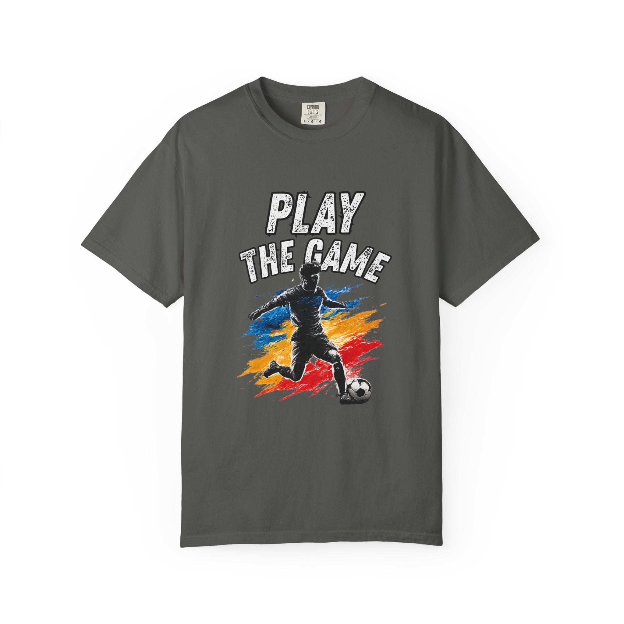 A dark gray crewneck t-shirt featuring a graphic print of a soccer player kicking a ball with the text 'PLAY THE GAME' above, set against a clean white background.