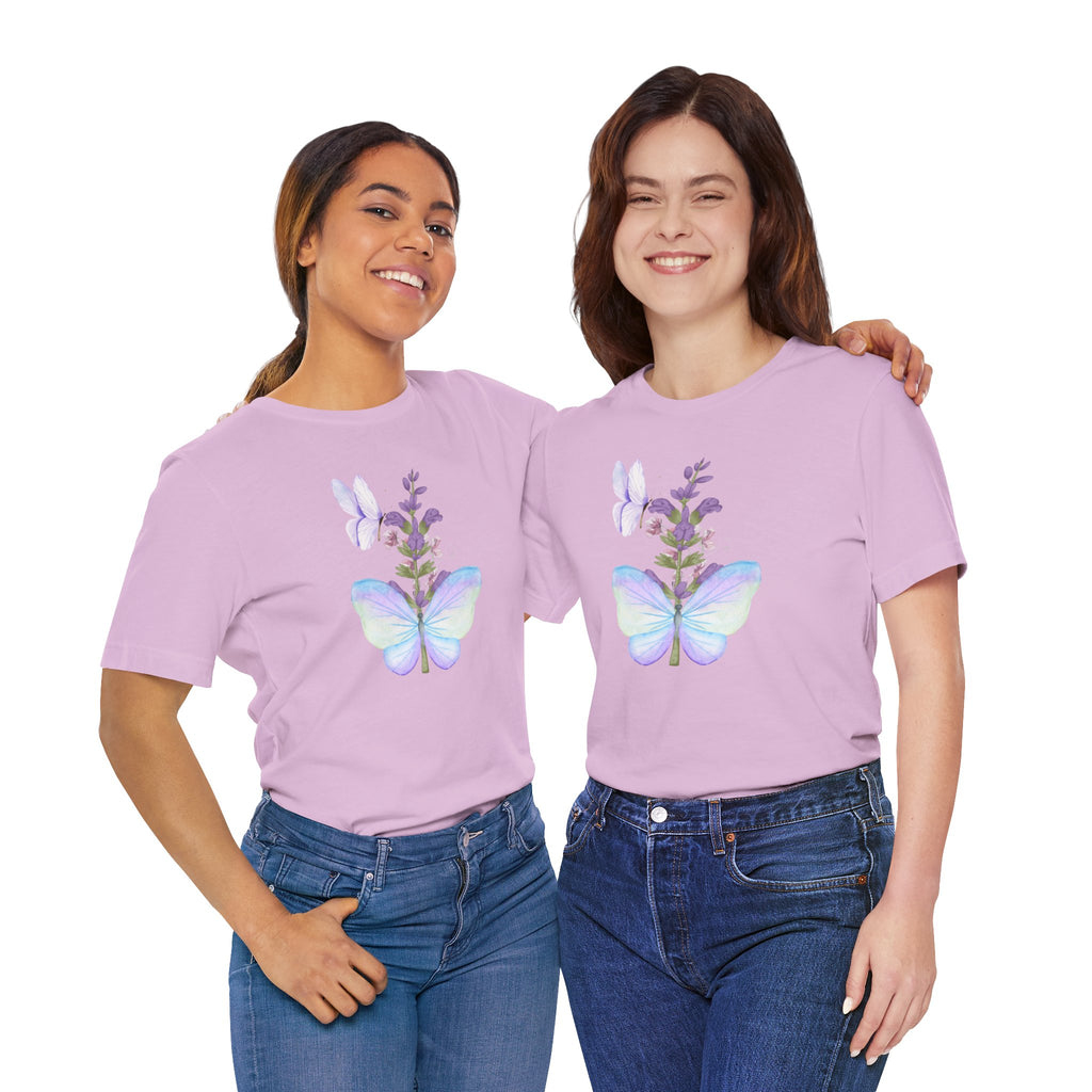 Two women wearing matching purple t-shirts with butterfly designs on a white background