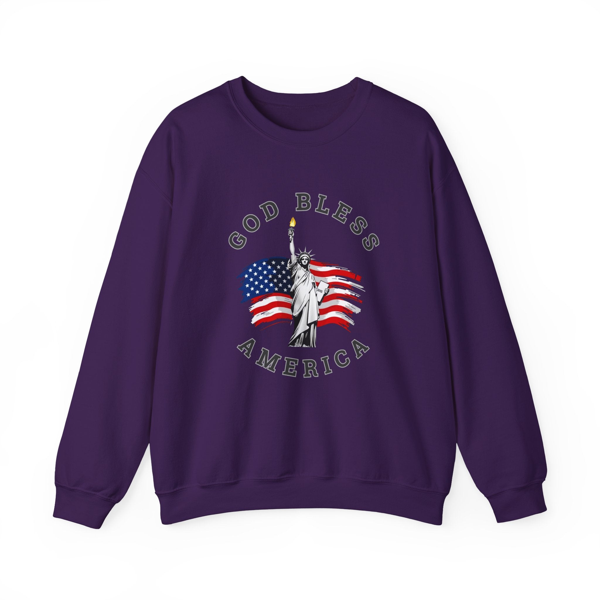 Purple sweatshirt with 'God Bless America' design featuring the Statue of Liberty and American flag on a white background.