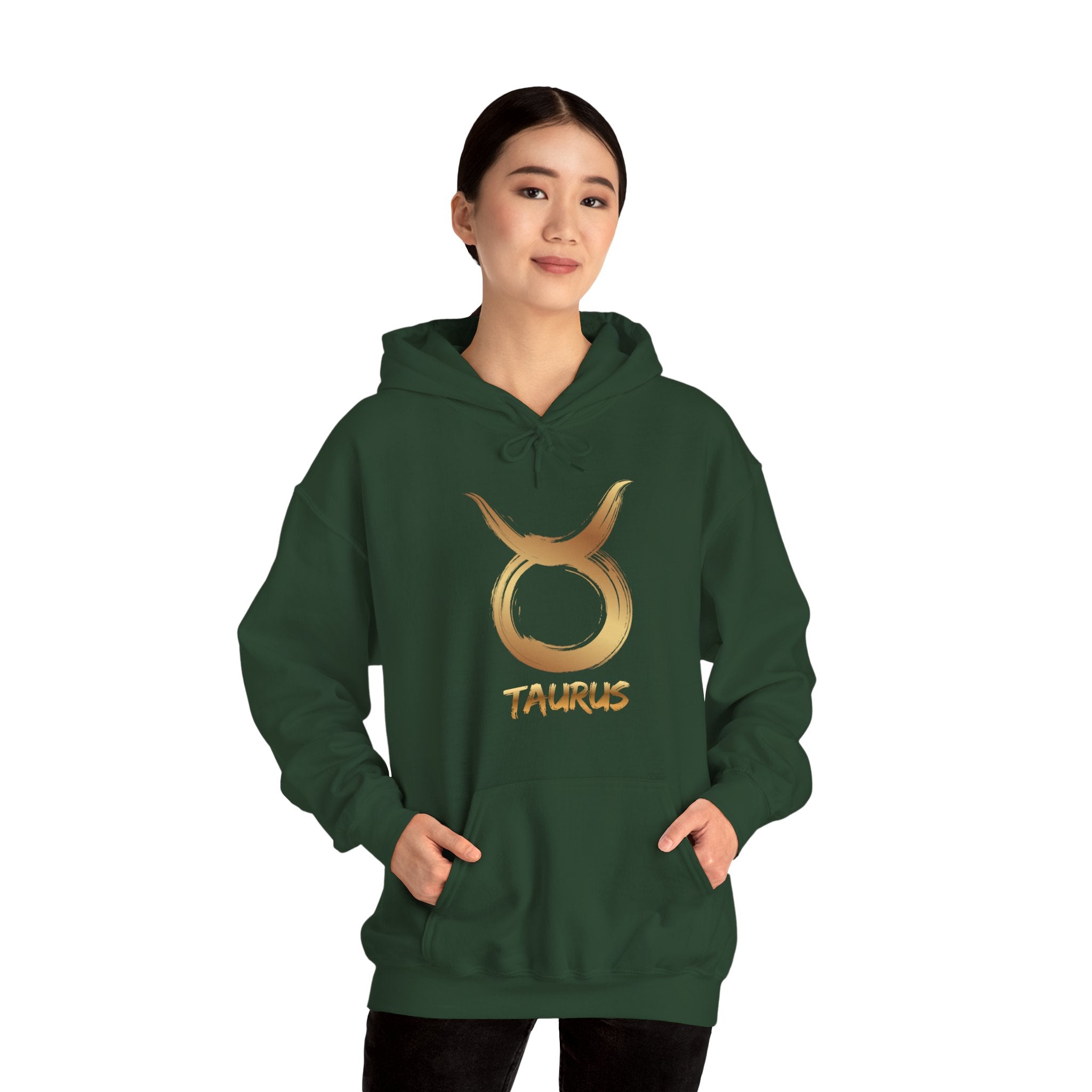 Person wearing a green hoodie with Taurus symbol and text on a white background