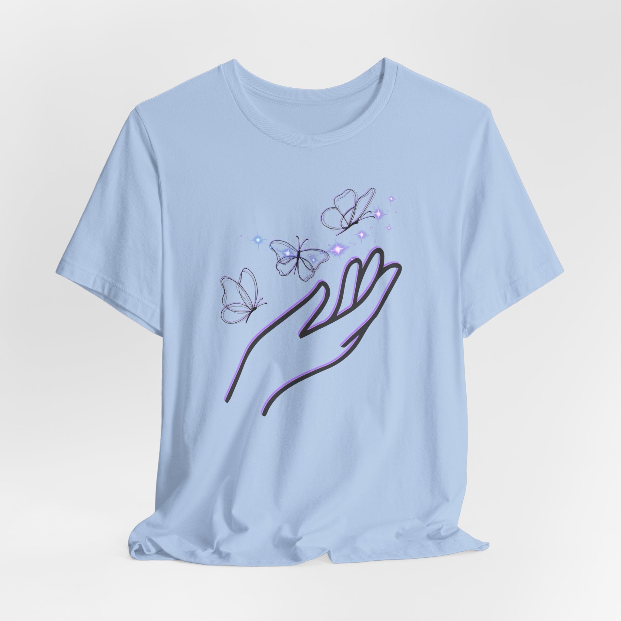 Light blue t-shirt with a design of a hand holding butterflies on a light gray background