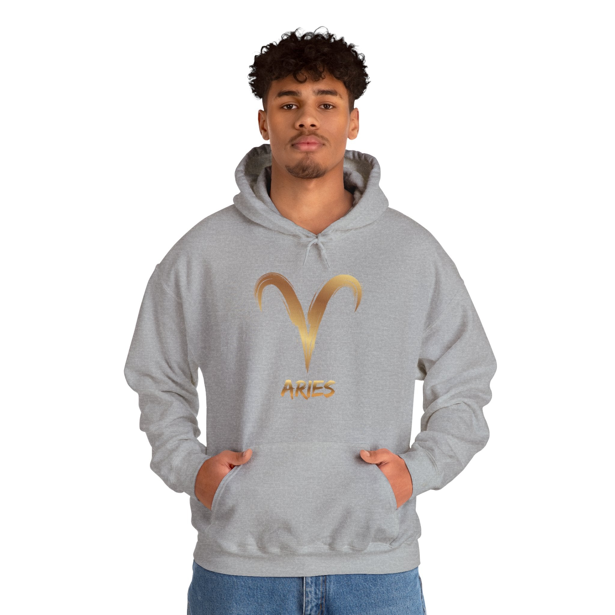 Person wearing a gray hoodie with gold Aries symbol and text on a white background