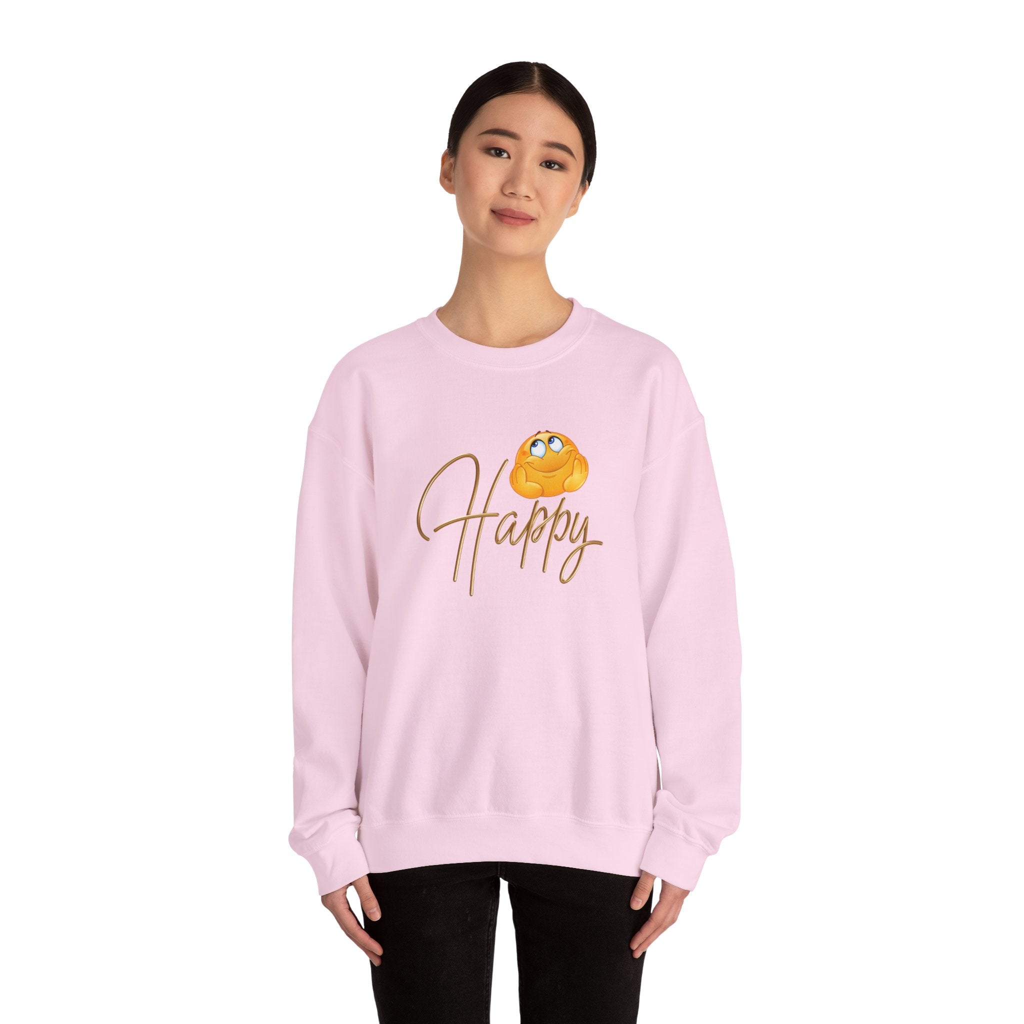 Person wearing a pink sweatshirt with a gold design and text on a white background