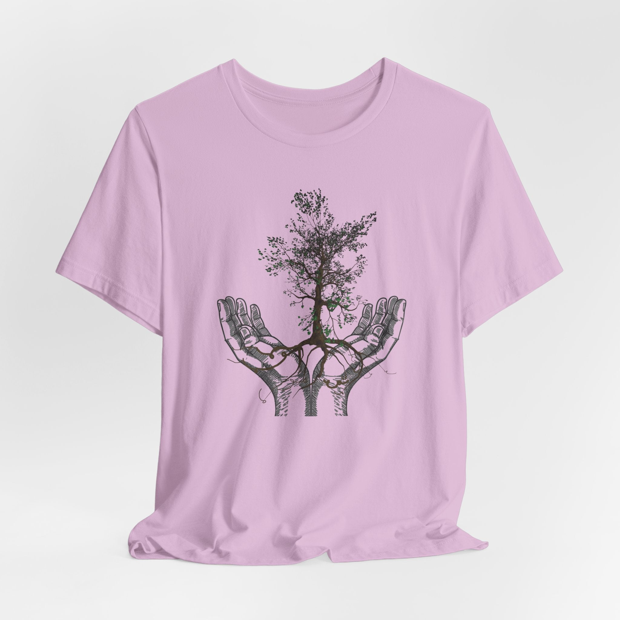 Light purple t-shirt with a graphic of hands holding a tree on a white background