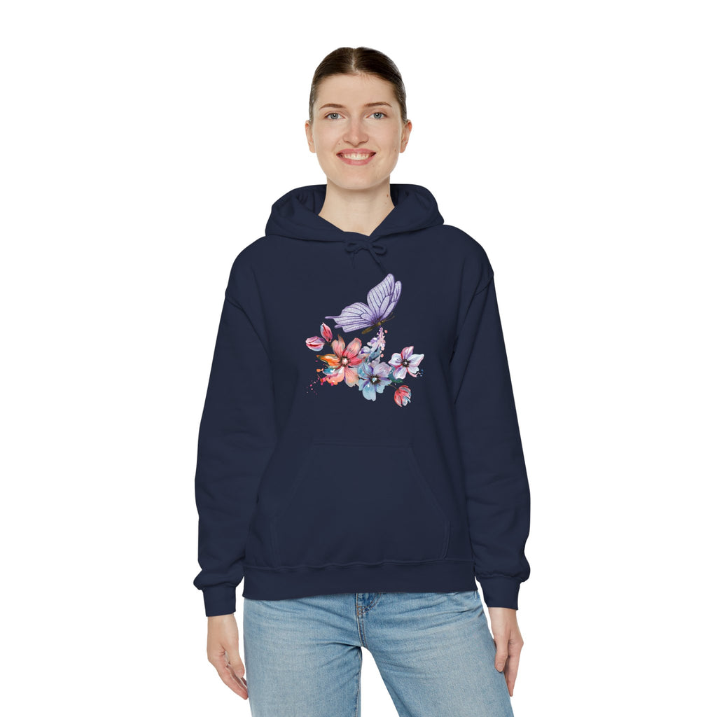 Person wearing a navy hoodie with floral and butterfly design on a white background