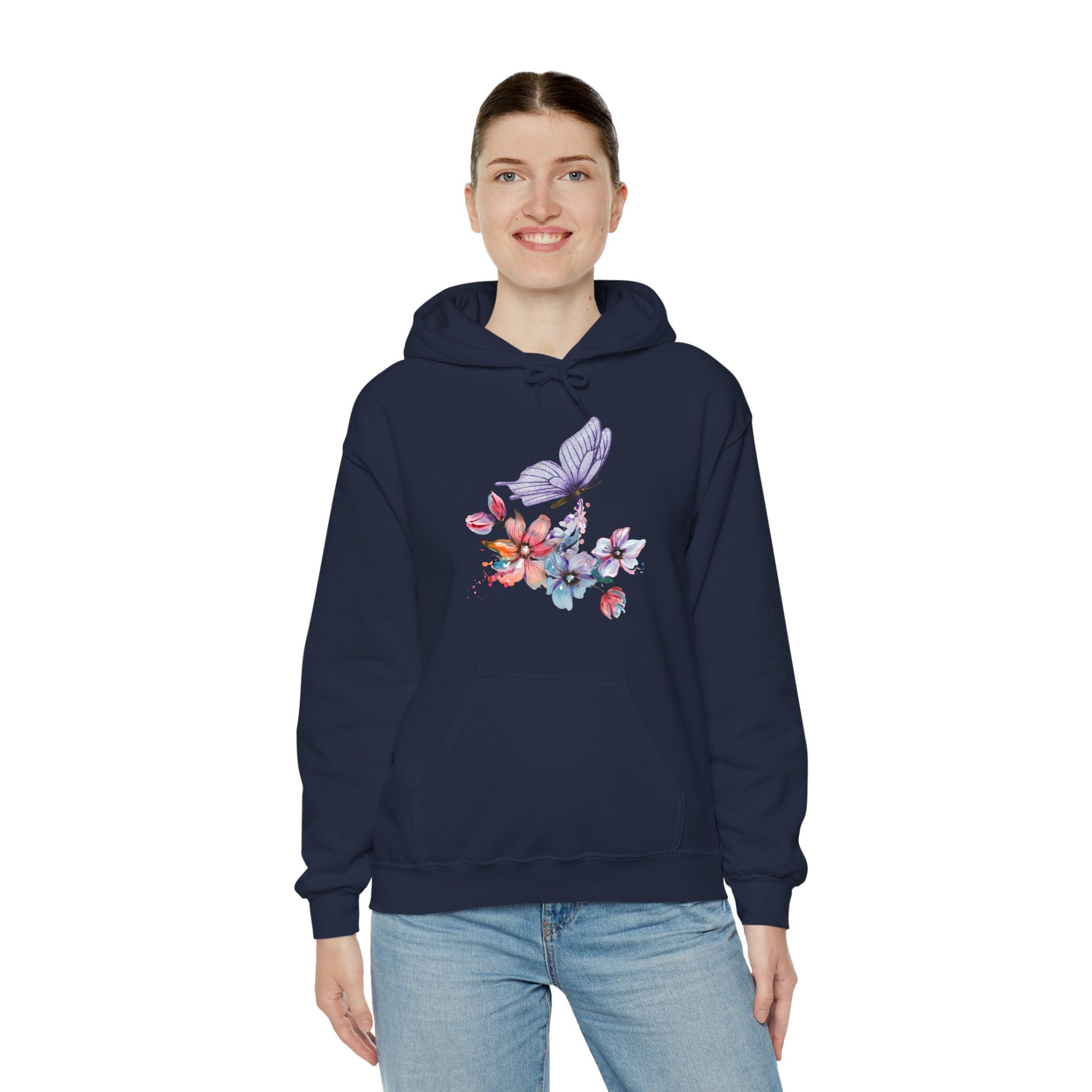 Person wearing a navy hoodie with floral and butterfly design on a white background