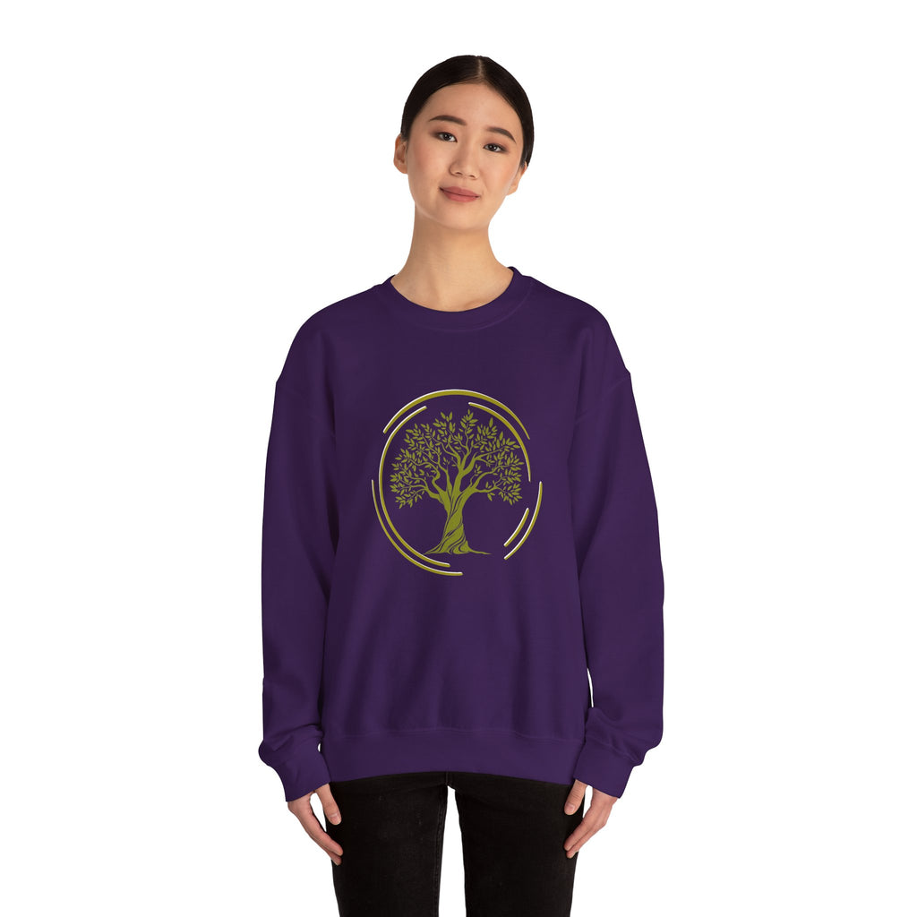 Person wearing a purple sweatshirt with a colorful mandala design on a white background