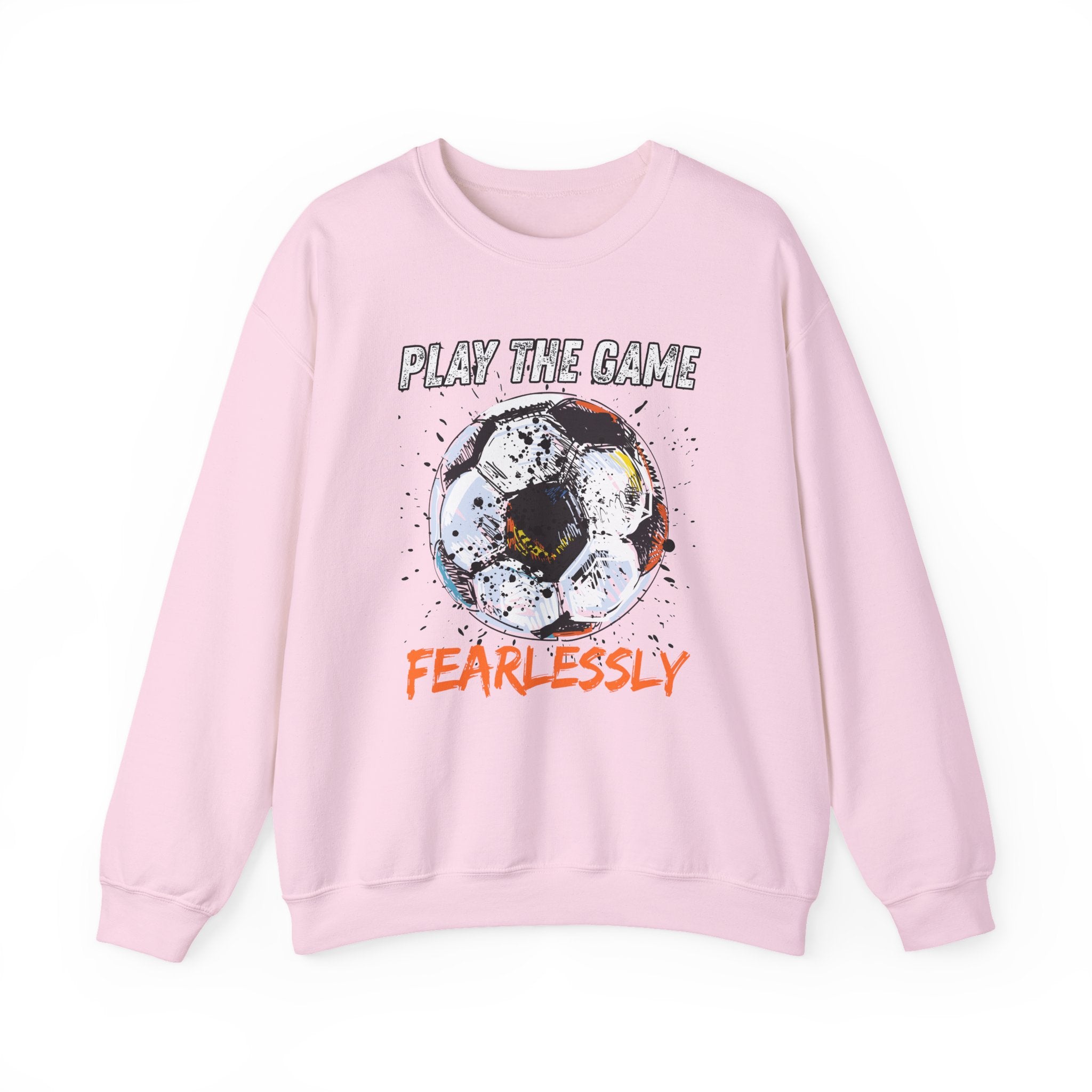 Pink sweatshirt with dirty soccer ball graphic and play the game fearlessly text on a white background