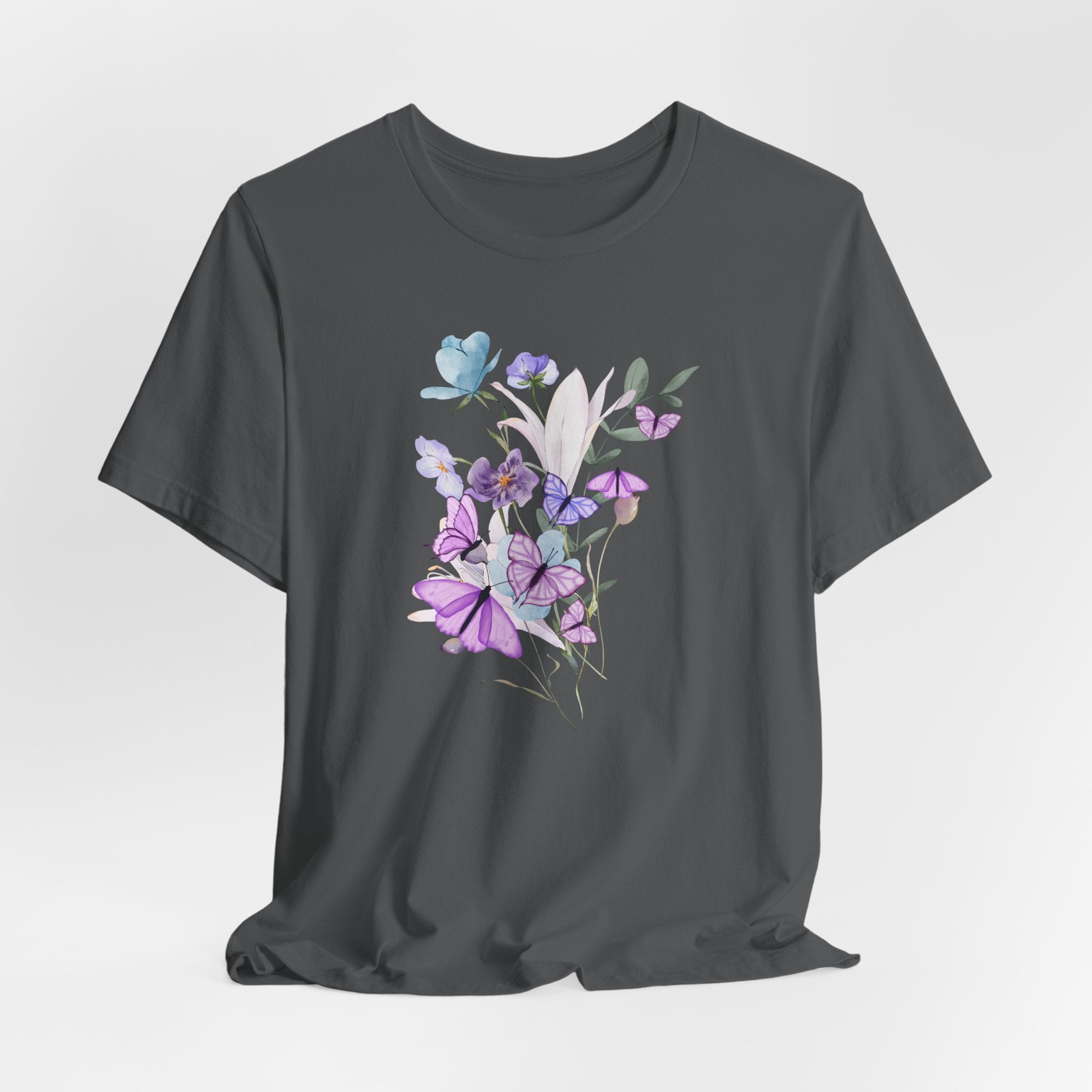 Black t-shirt with a floral design on a light gray background
