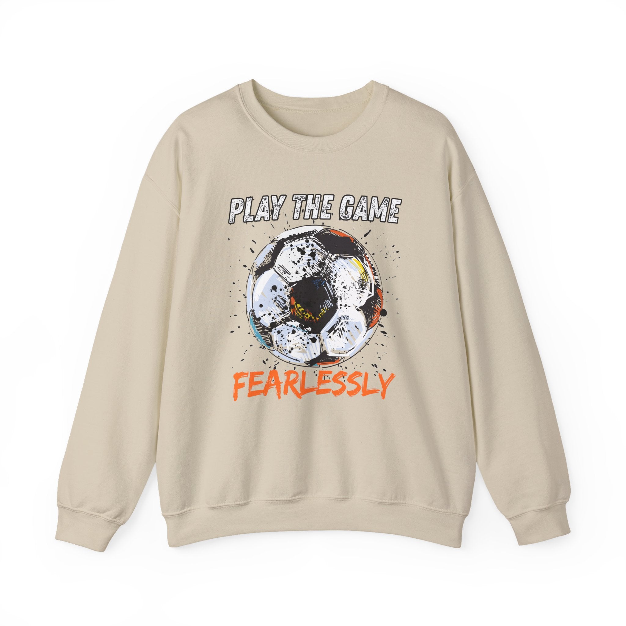 Beige sweatshirt with dirty soccer ball graphic and play the game fearlessly text on a white background