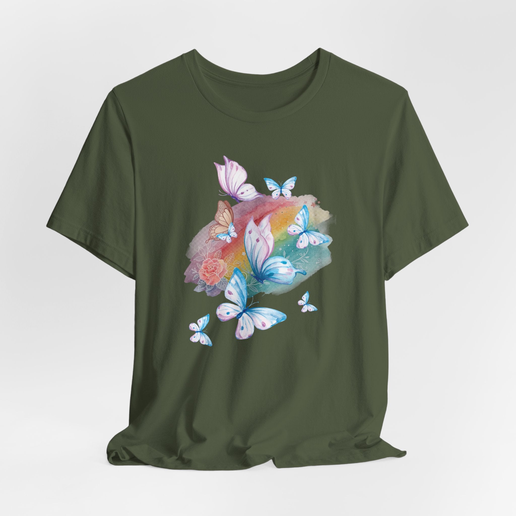 Green t-shirt with colorful butterfly design on a light gray background