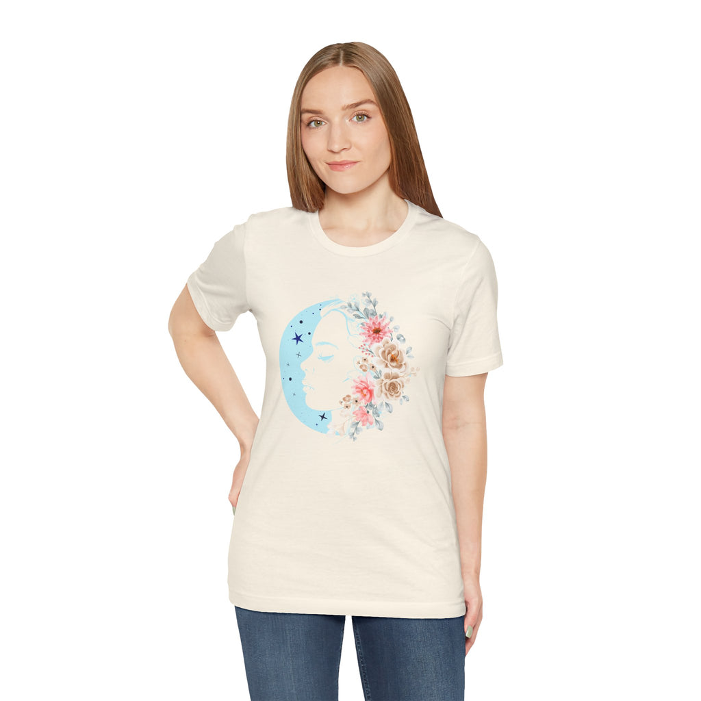 Woman wearing a cream t-shirt with a floral 'C' design on a white background