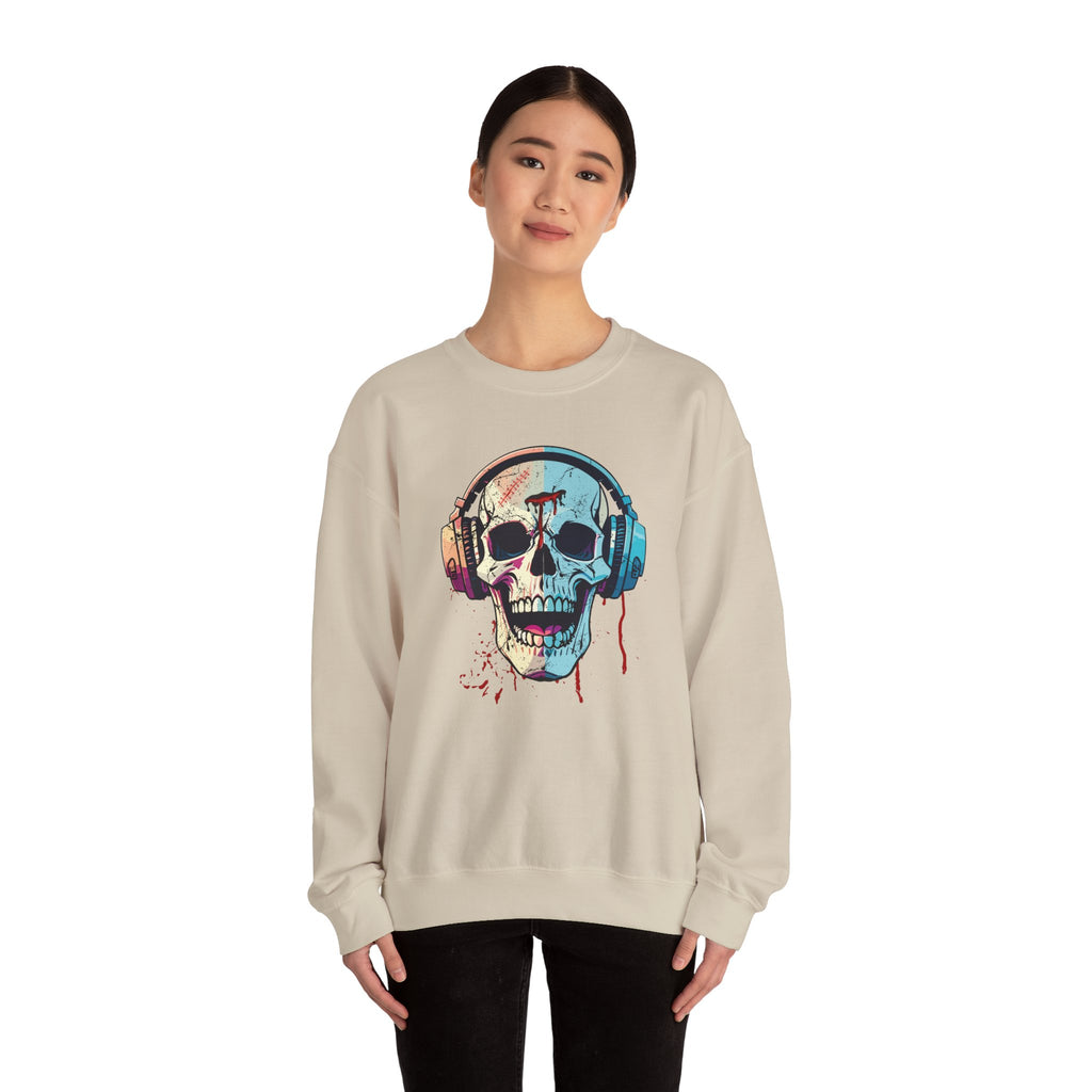 Person wearing a beige sweatshirt with a colorful skull and headphones design on a white background
