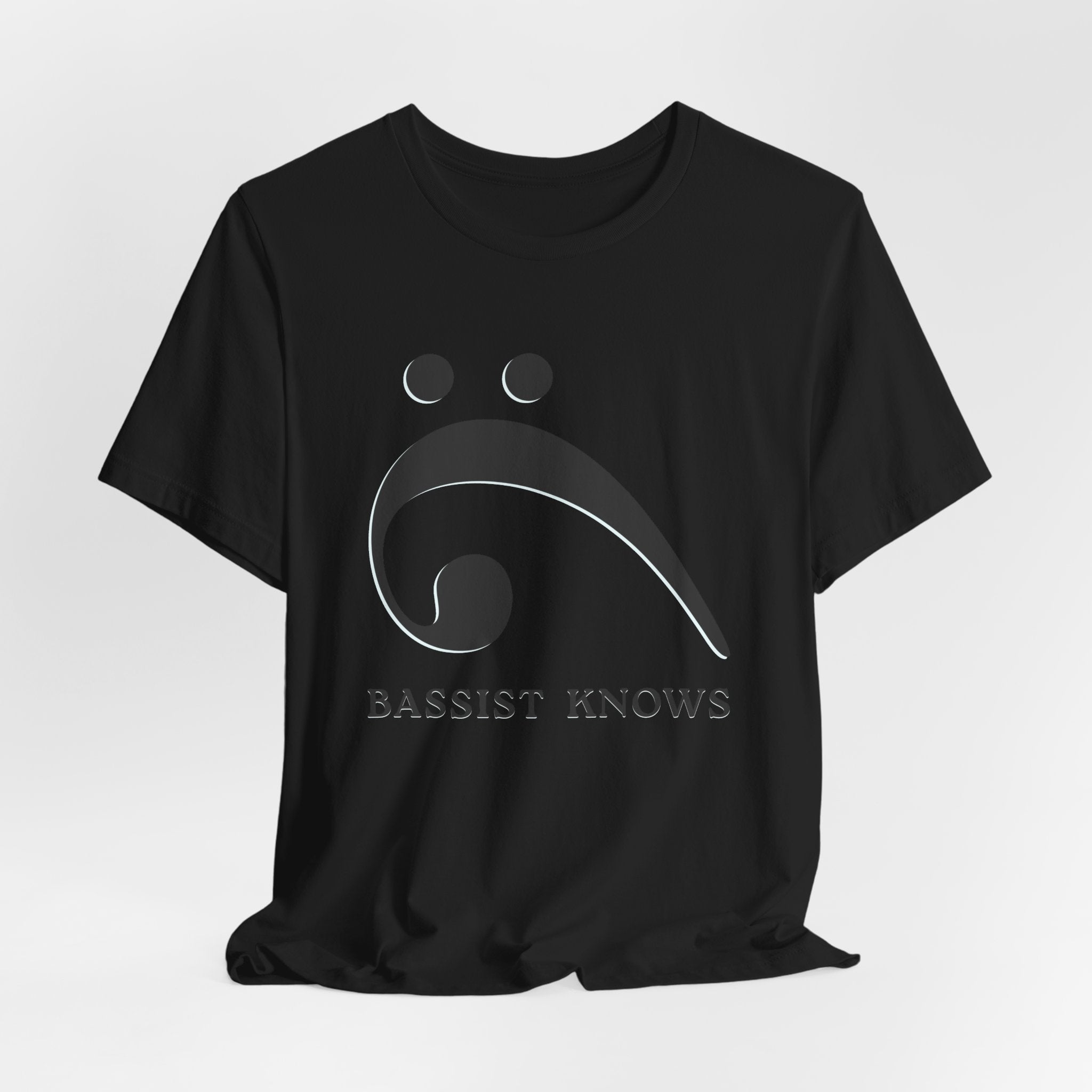 Black t-shirt with black bass clef and 'Bassist Knows' text on a light gray background