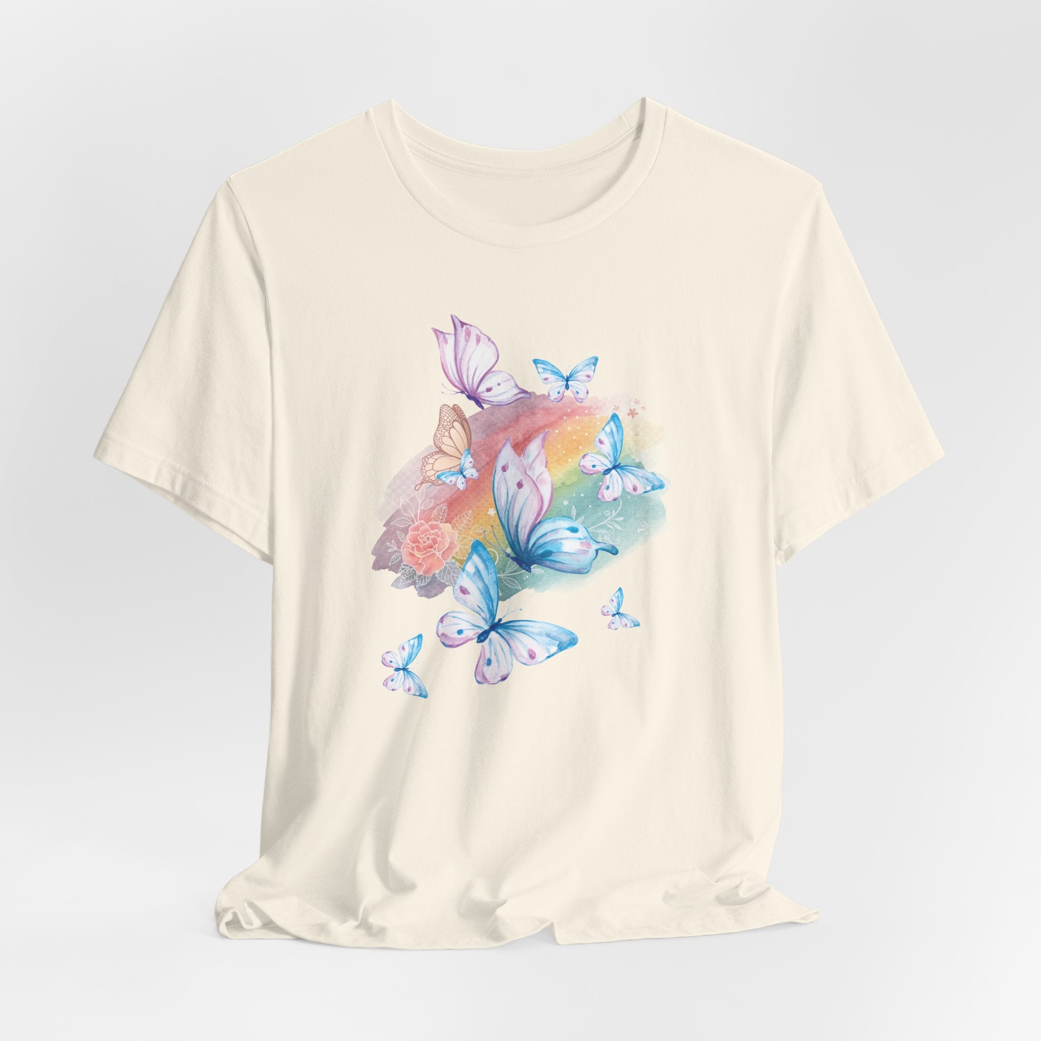 Beige t-shirt with colorful butterfly design on a light gray background
