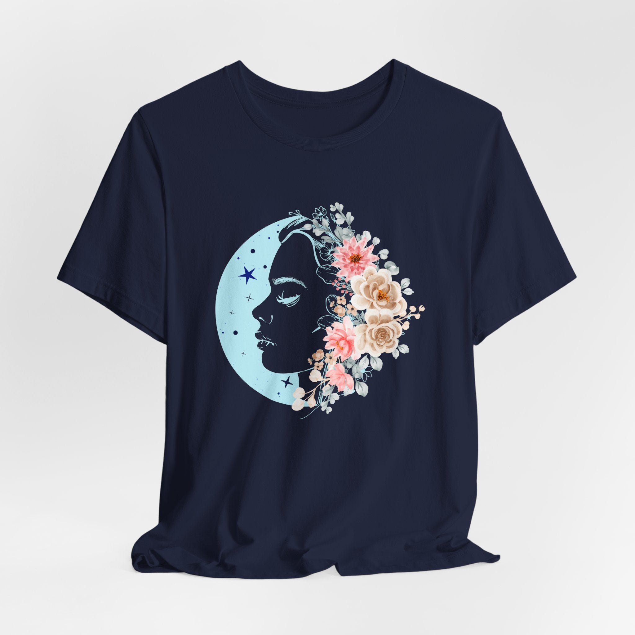Navy blue t-shirt with a floral moon and silhouette design on a light gray background