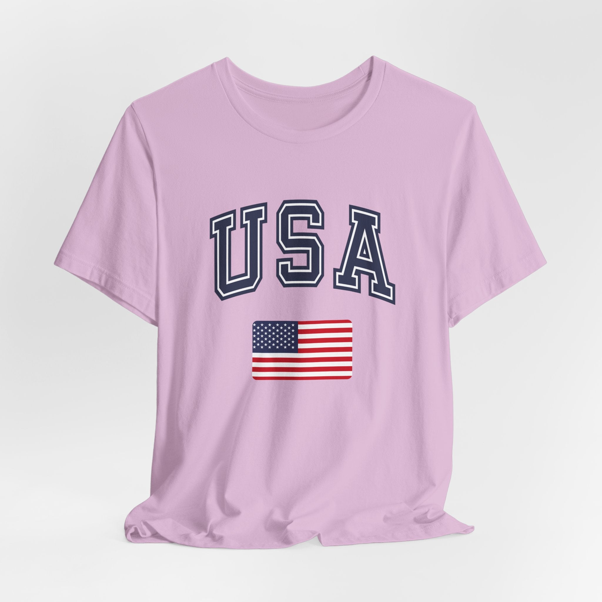 Light purple t-shirt with 'USA' text and American flag on a light gray background