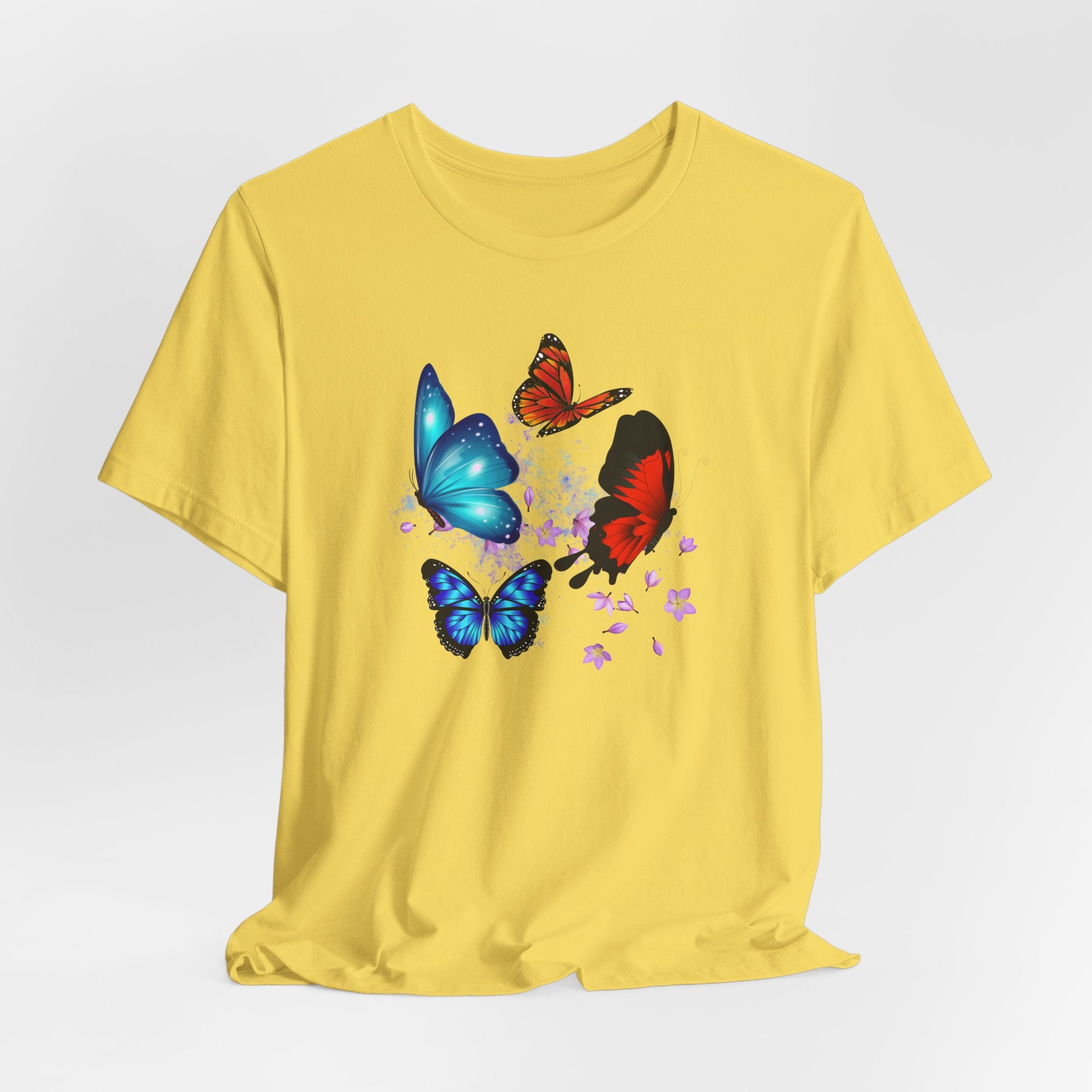 Yellow t-shirt with colorful butterfly design on a white background