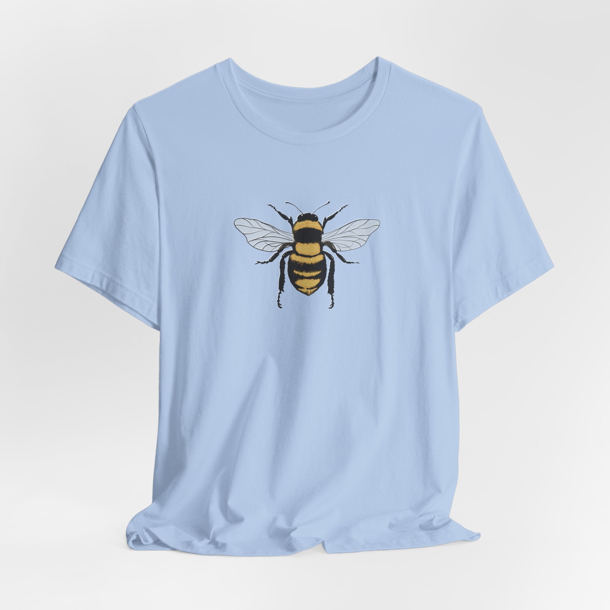 Light blue t-shirt with a bee design on a white background