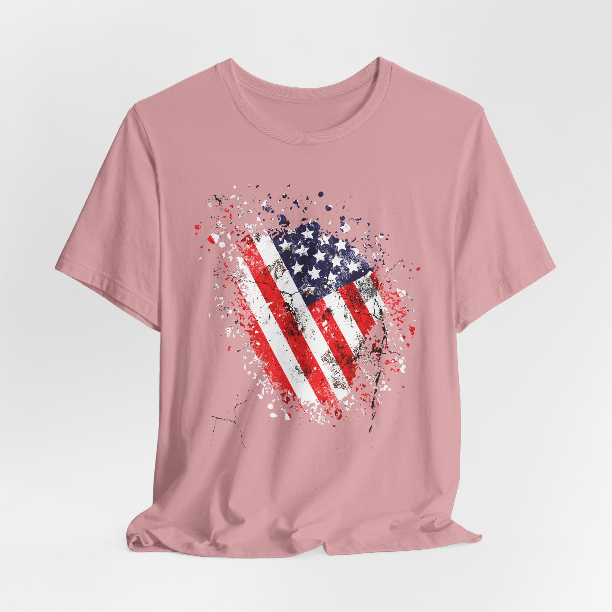 Pink t-shirt with American flag design on a light gray background