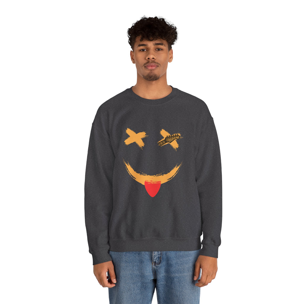 Person wearing a dark gray sweatshirt with a smiley face design on a white background