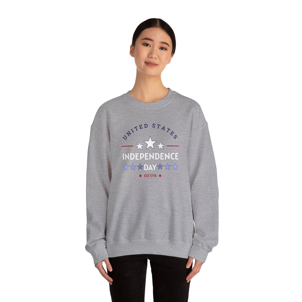 Person wearing a gray sweatshirt with 'United States Independence Day' text on a white background