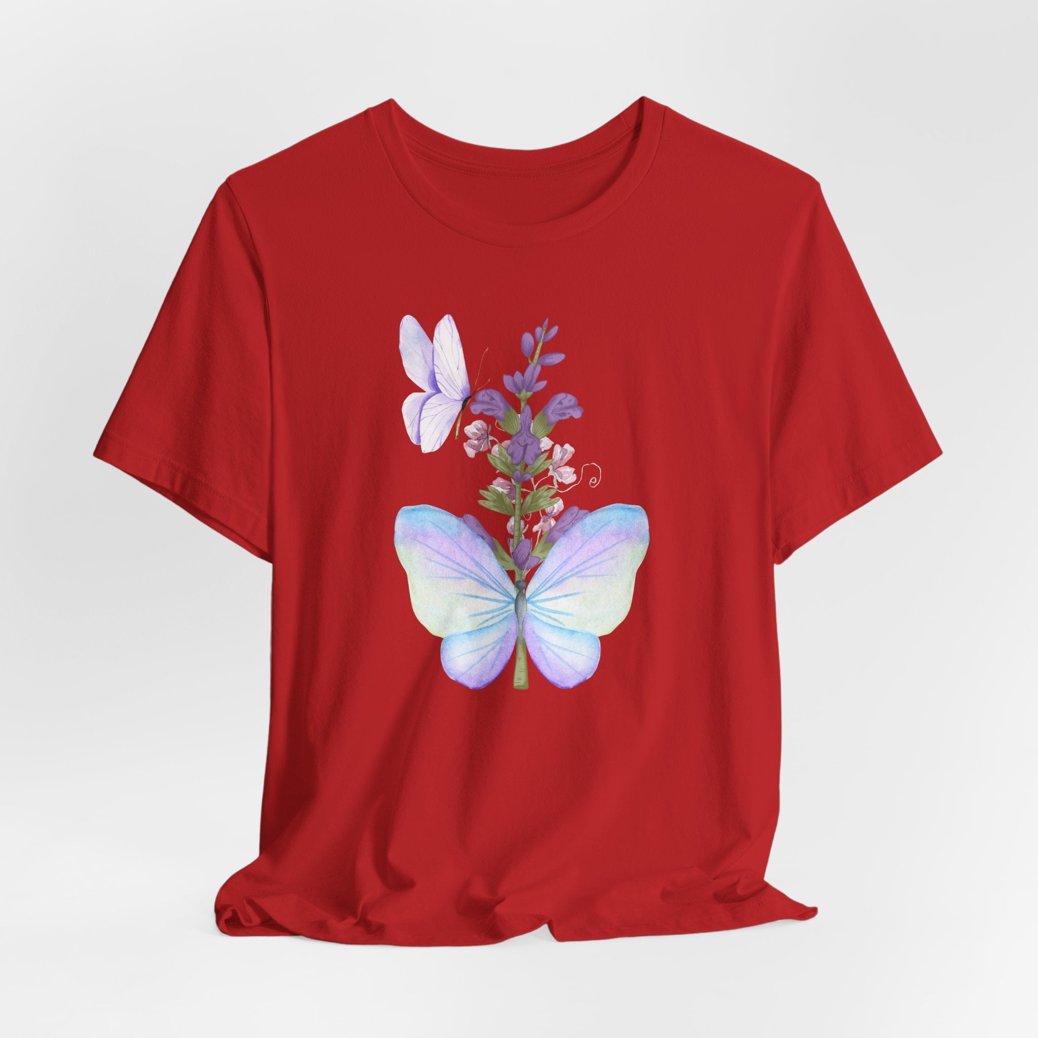 Red t-shirt with a butterfly and floral design on a white background
