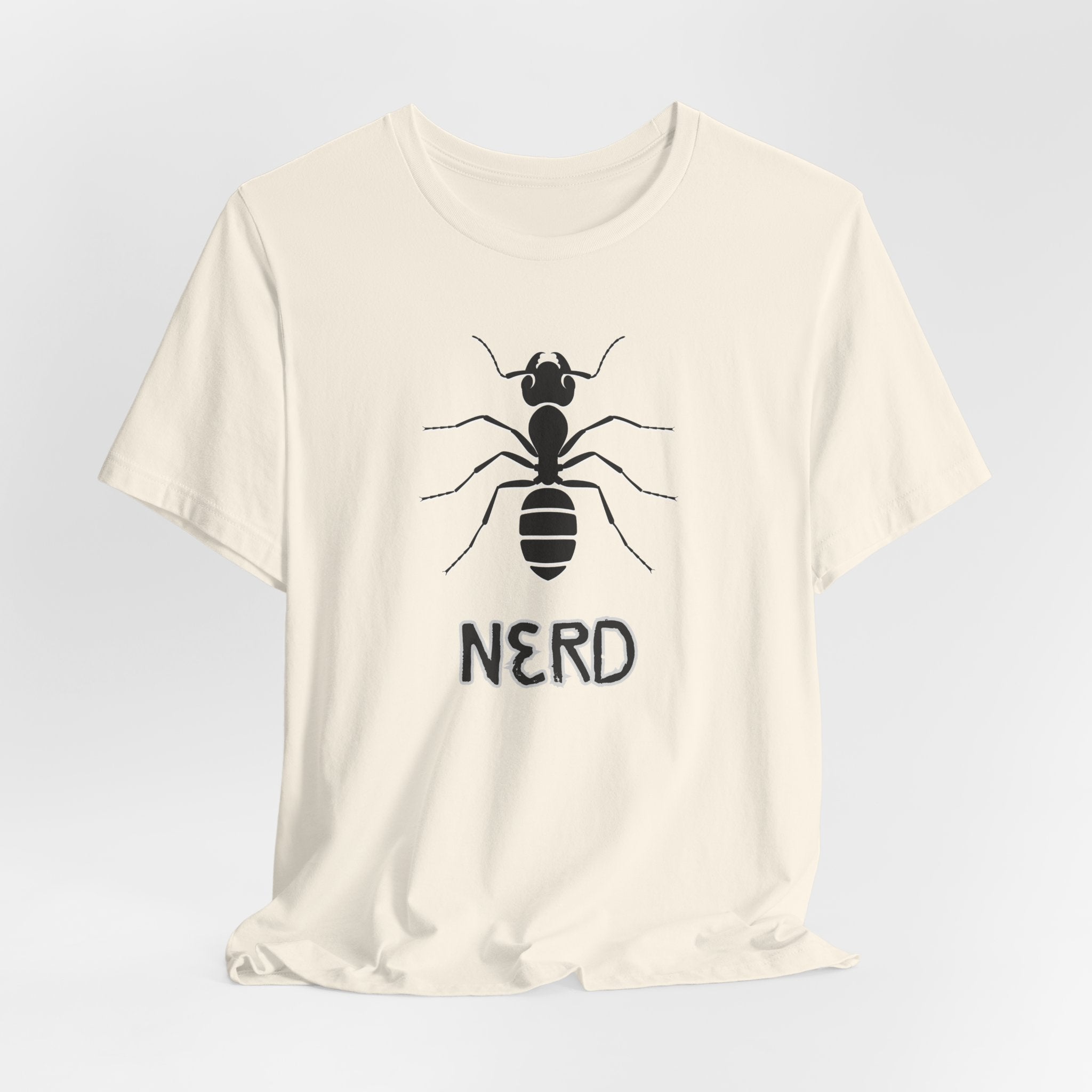 White t-shirt with an ant design and text nerd on a light gray background