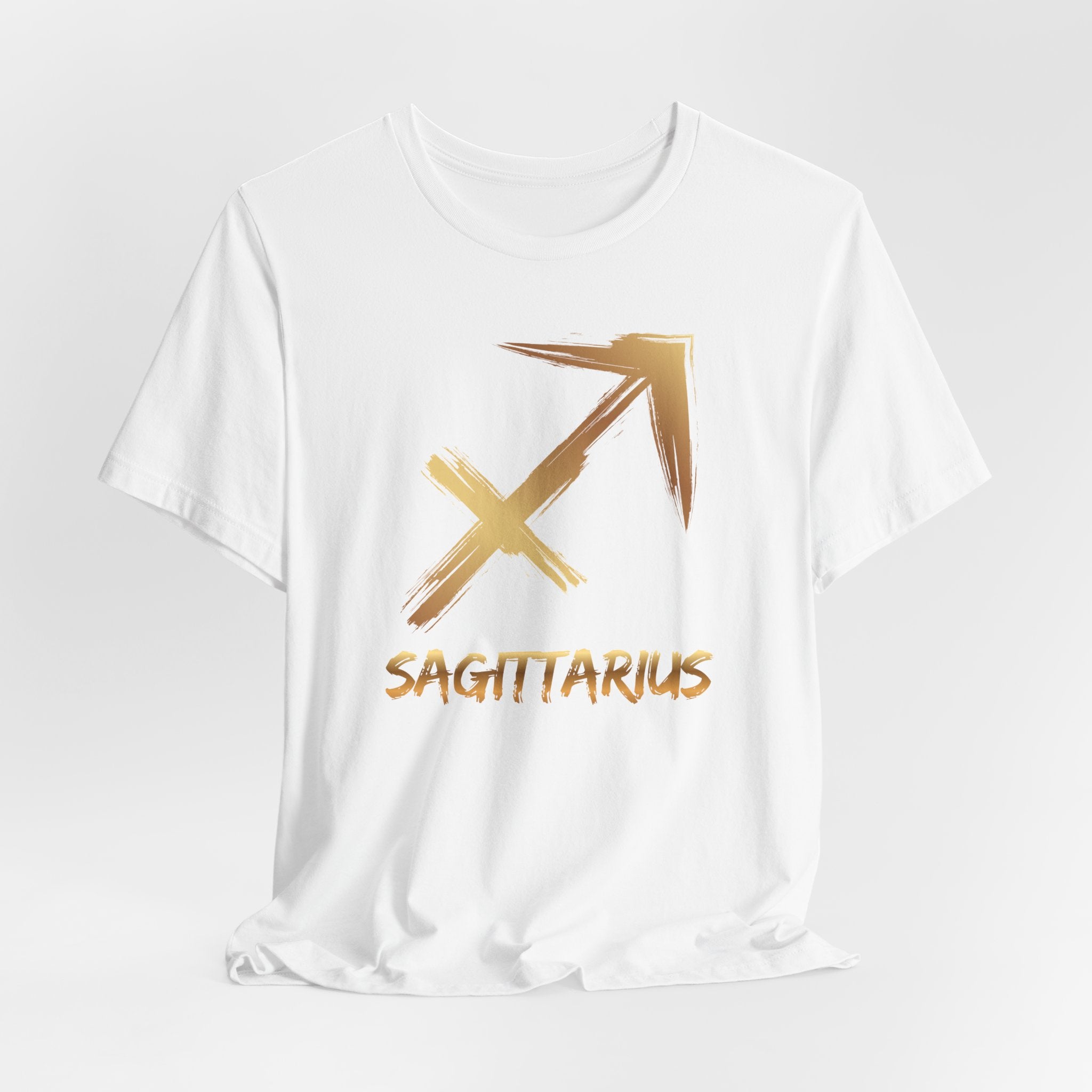 White t-shirt with gold Sagittarius symbol on a white background