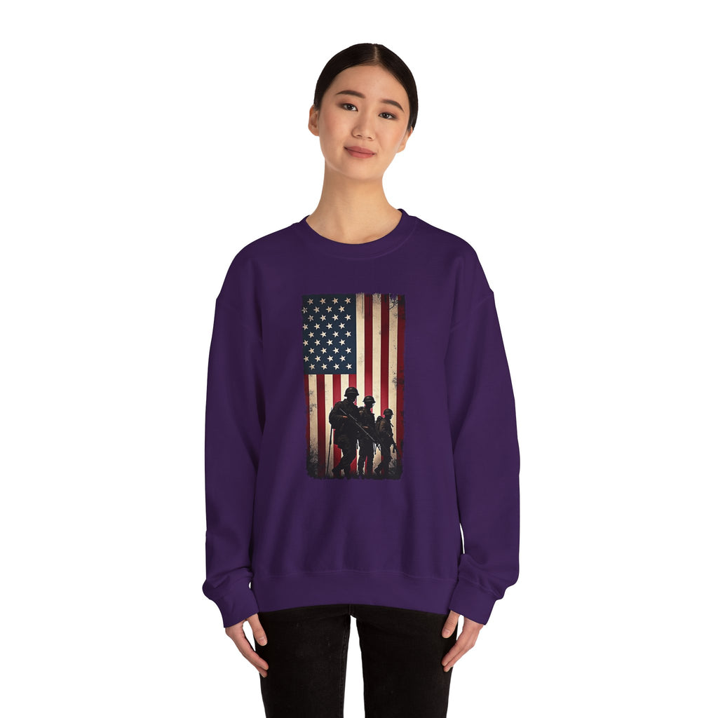 Person wearing a purple sweatshirt with an American flag and silhouette design on a white background