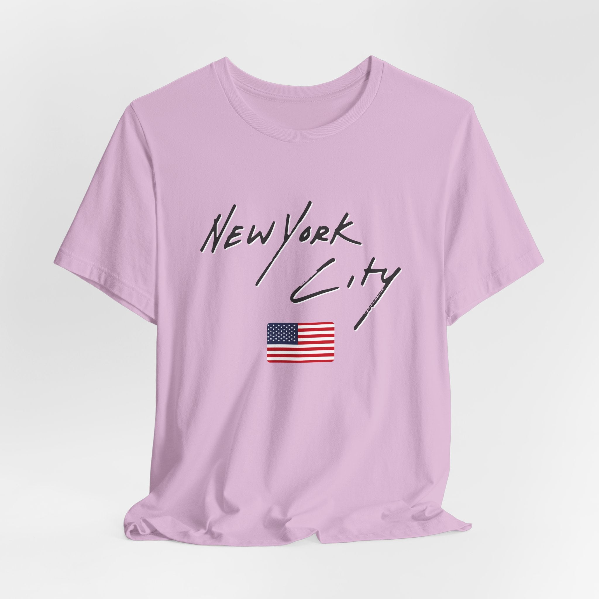 Light purple t-shirt with 'New York City' text and American flag on a light gray background