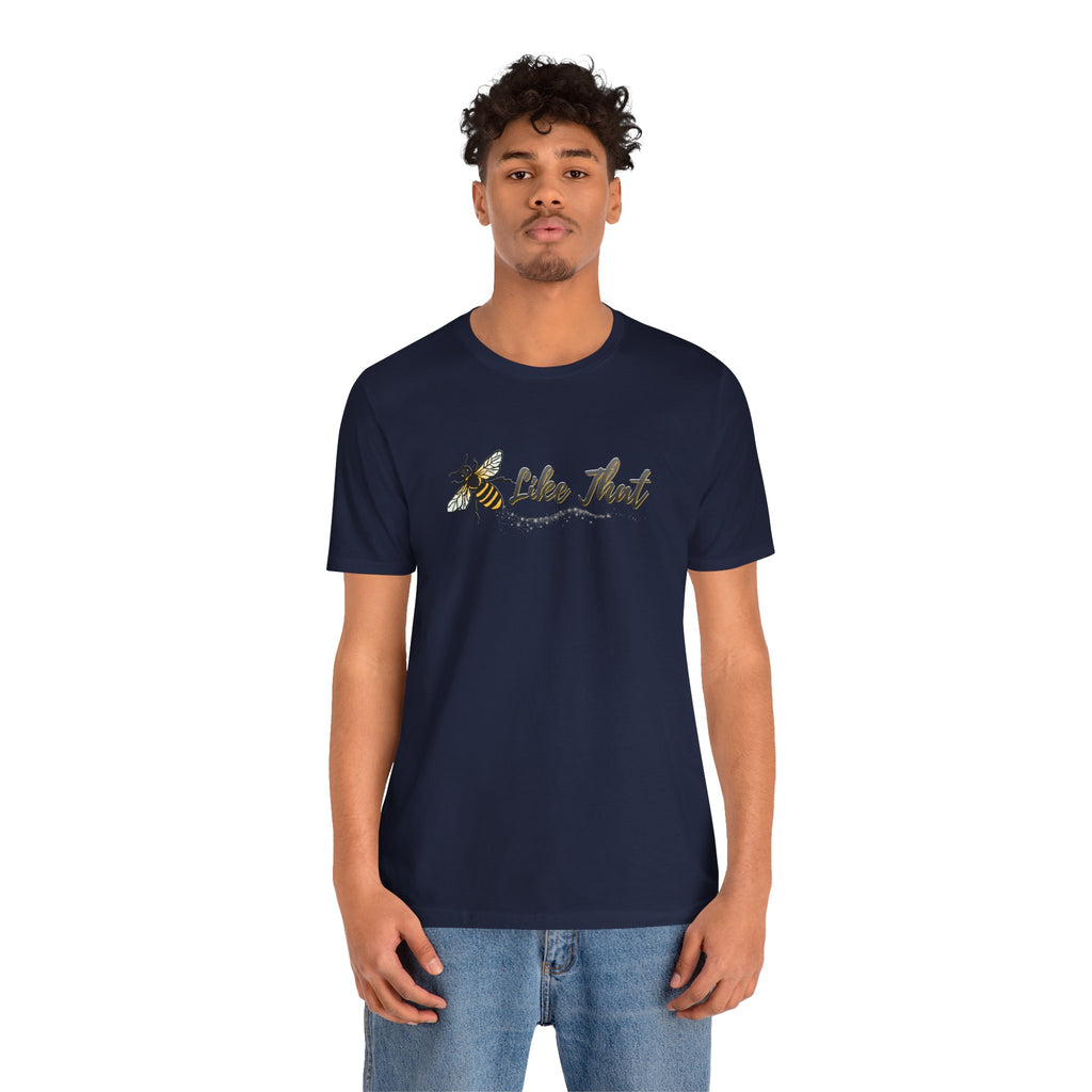 Man wearing a navy blue t-shirt with a graphic design on a white background
