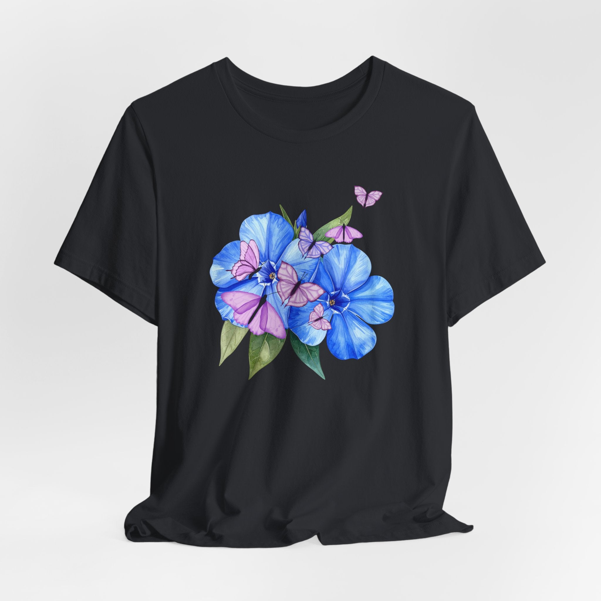 Black t-shirt with blue floral design on a white background
