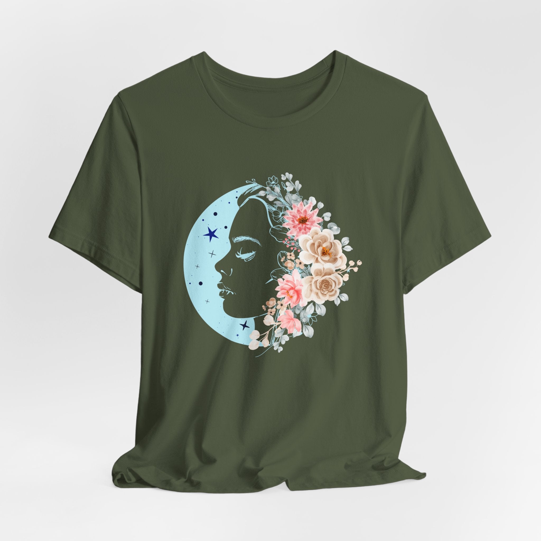 Green t-shirt with a floral moon and face design on a white background