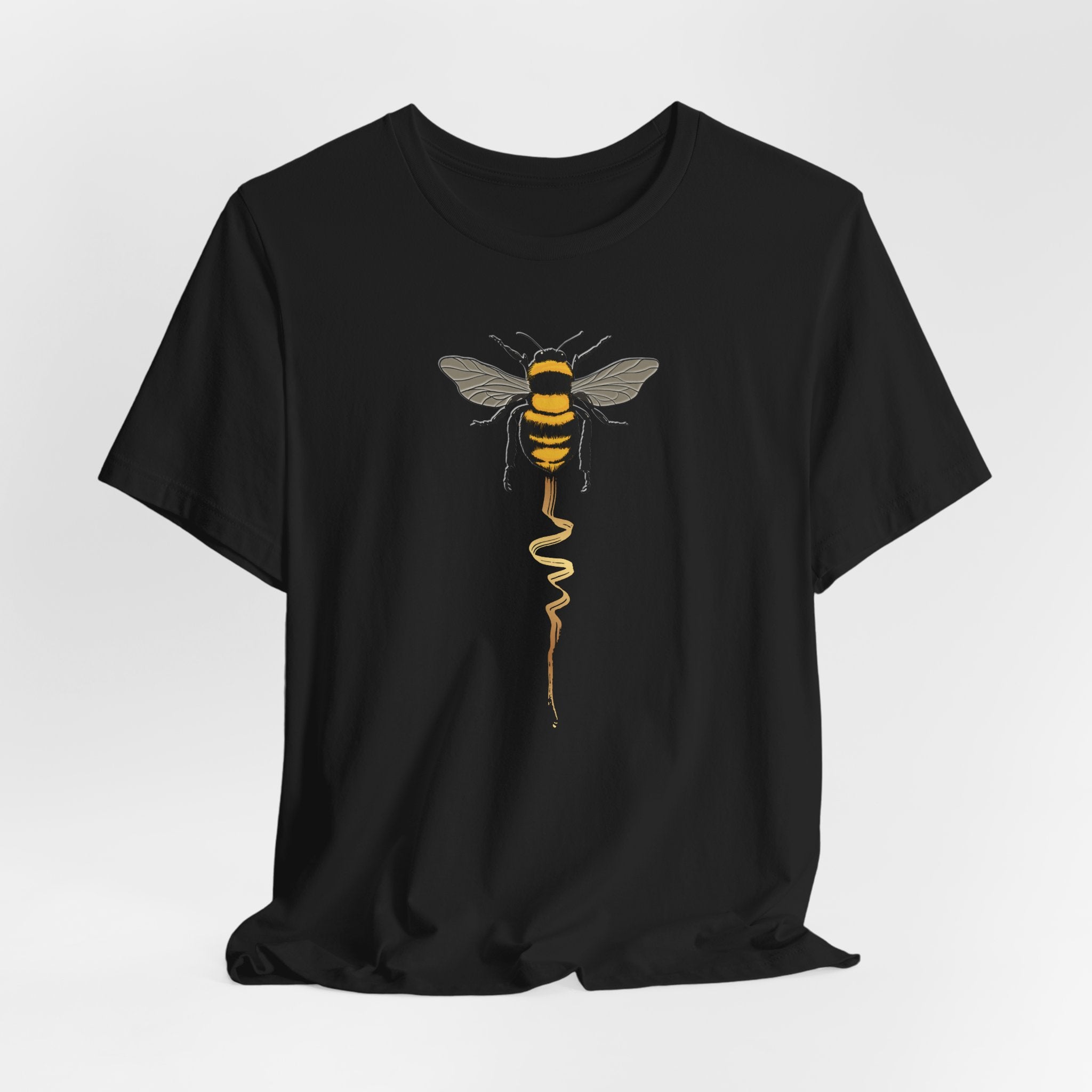 Black t-shirt with a bee design on a white background