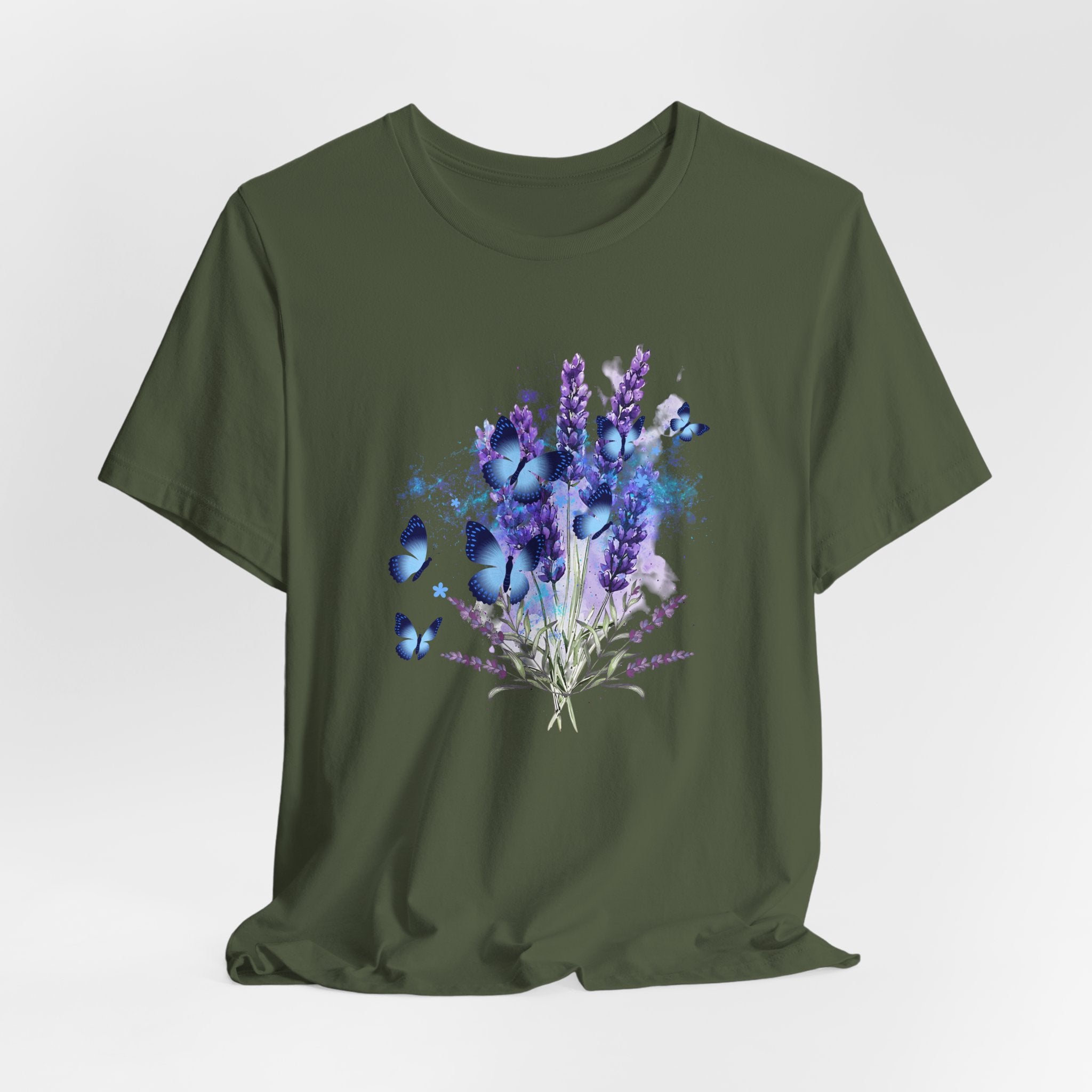 Green t-shirt with a floral and butterfly design on a light gray background