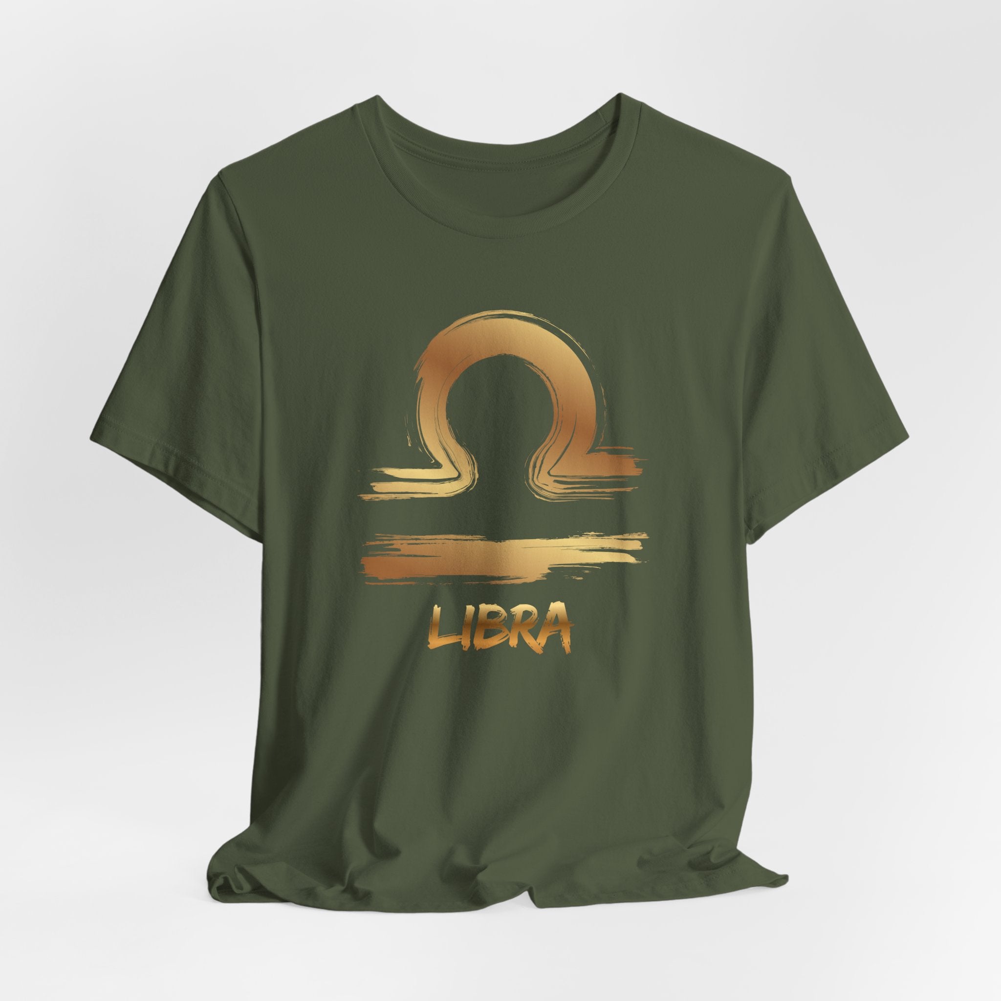 Green t-shirt with Libra zodiac symbol in gold on a white background