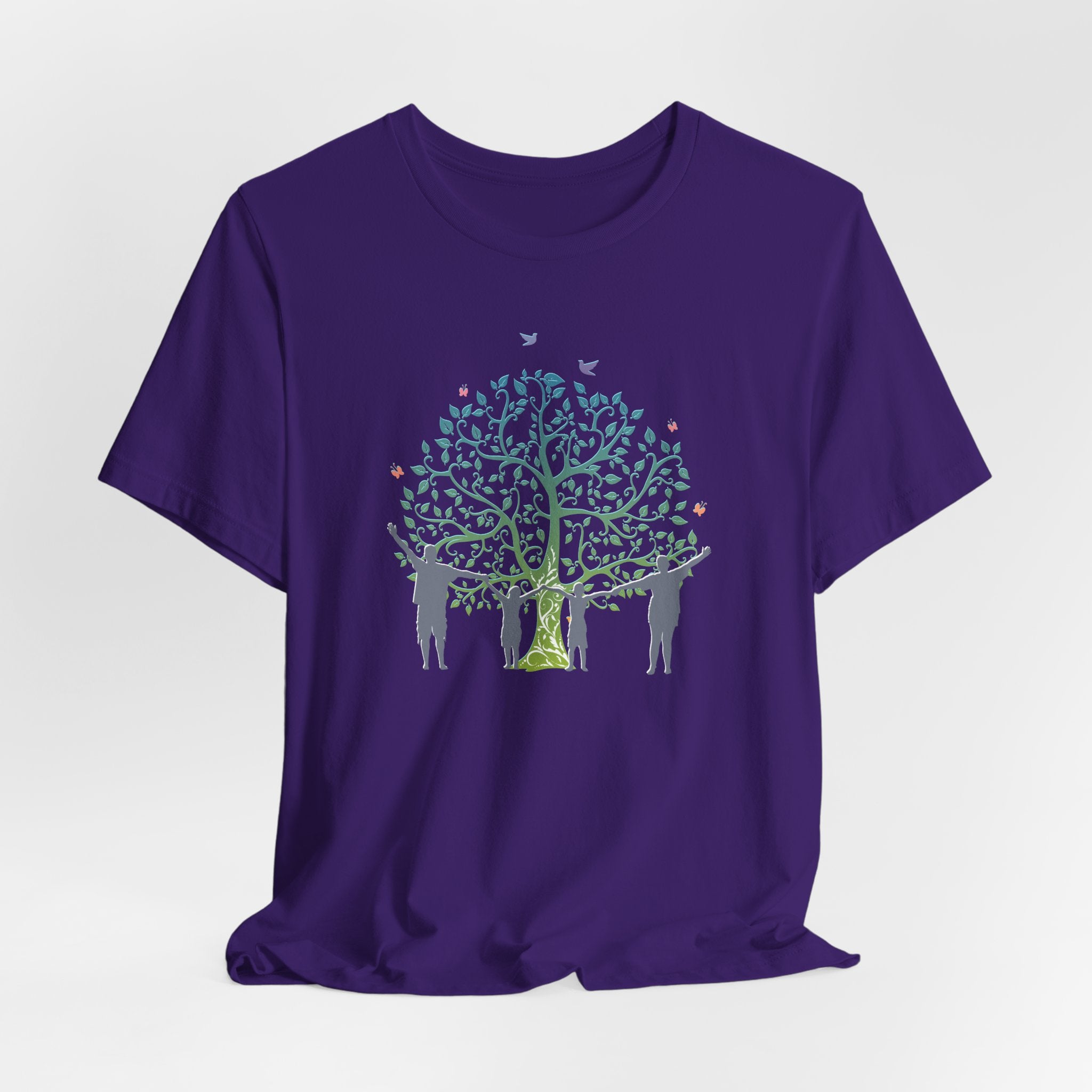Purple t-shirt with a tree and people graphic on a white background