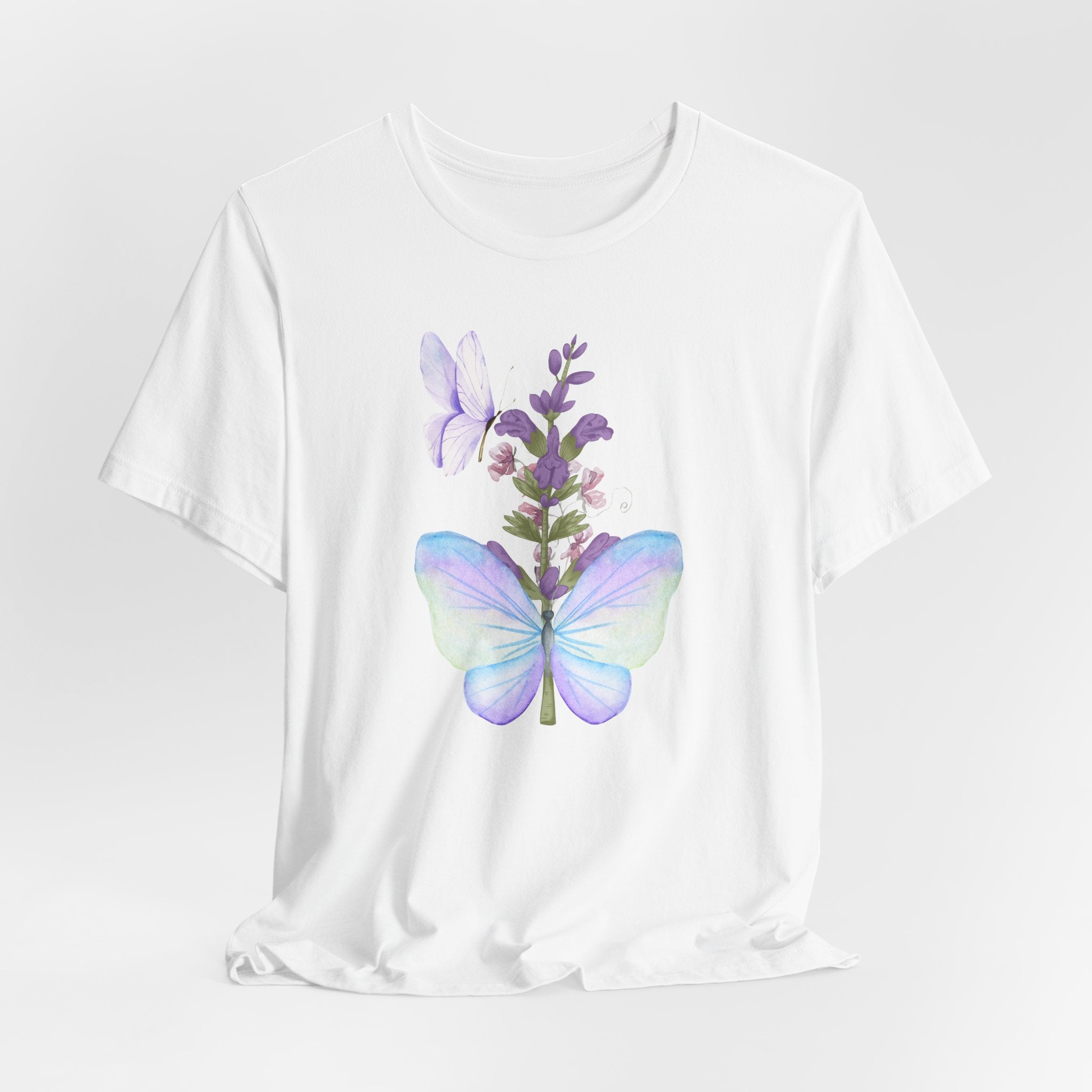 White t-shirt with a butterfly and lavender graphic on a light gray background
