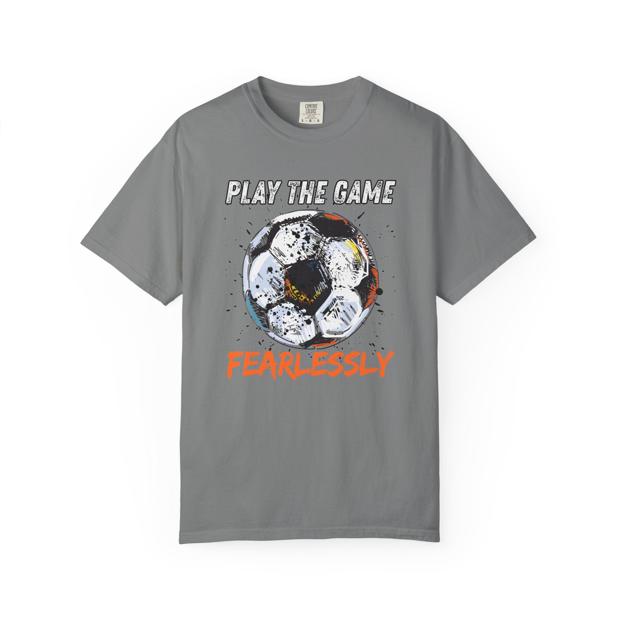 Light grey t-shirt with dirty soccer ball graphic and play the game fearlessly text on a white background