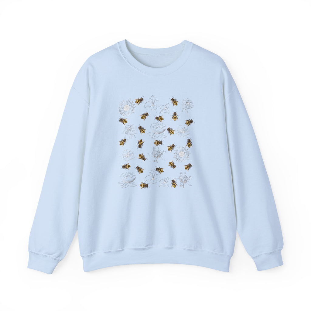 Light blue sweatshirt with bee and flower pattern on a white background