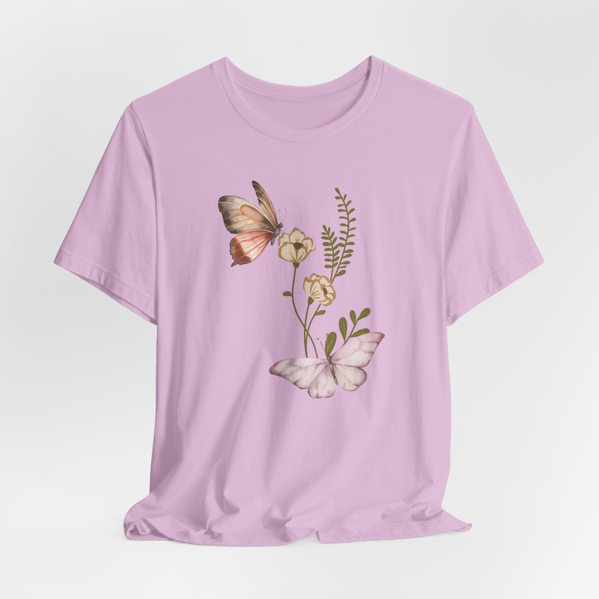 Light purple t-shirt with butterfly and floral design on a light gray background