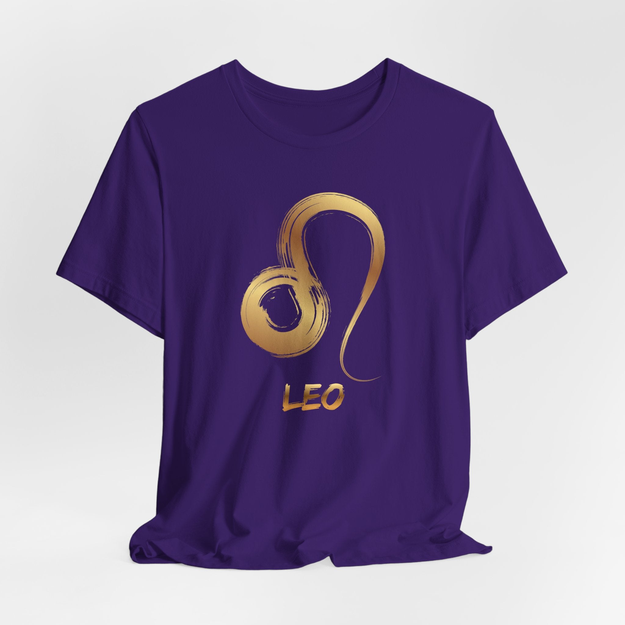Purple t-shirt with gold lion symbol and 'LEO' text on a white background