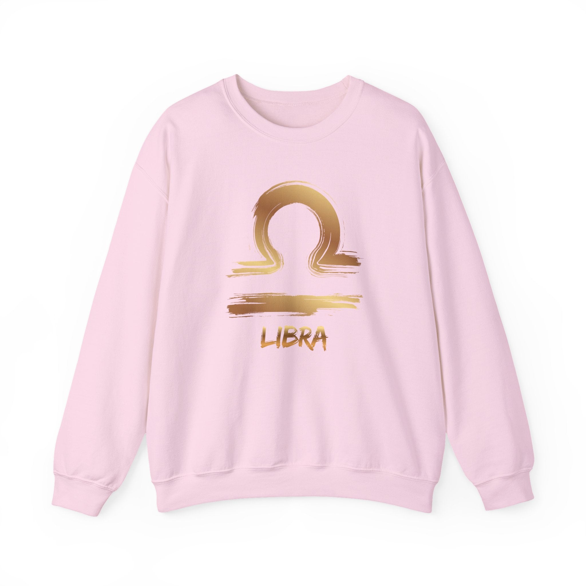 Pink sweatshirt with gold Libra zodiac symbol on a white background