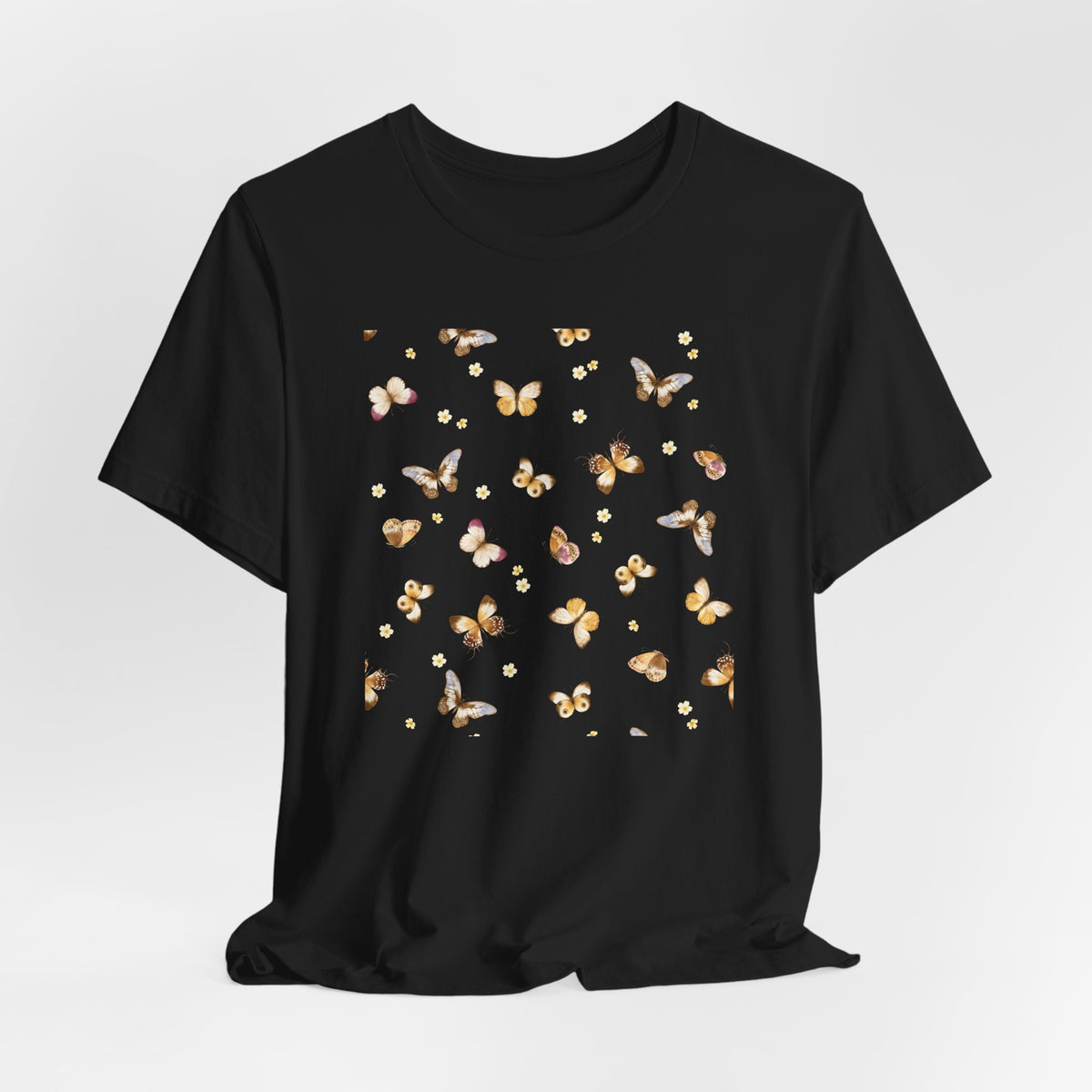 Black t-shirt with butterfly design on a white background