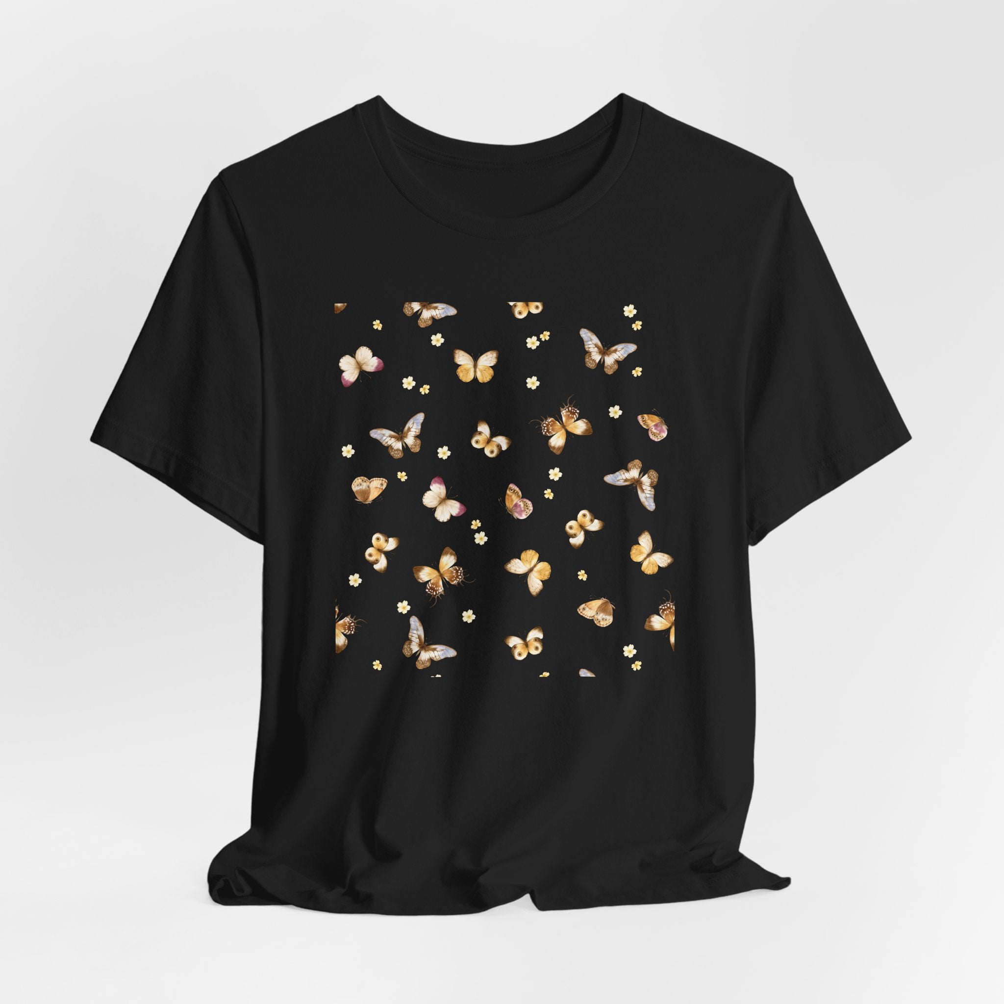 Black t-shirt with butterfly design on a white background